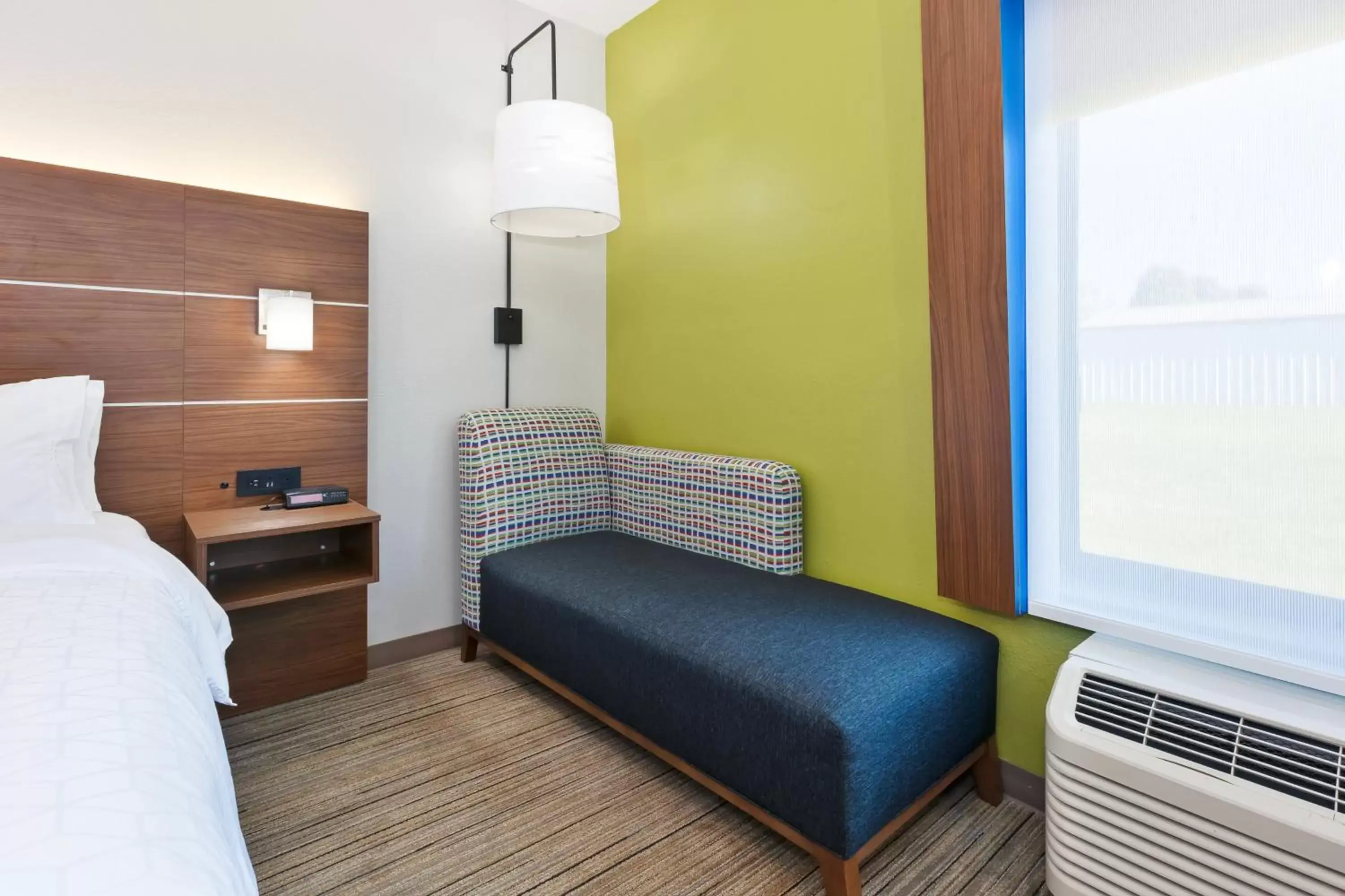 Bedroom, Seating Area in Holiday Inn Express and Suites Three Rivers, an IHG Hotel