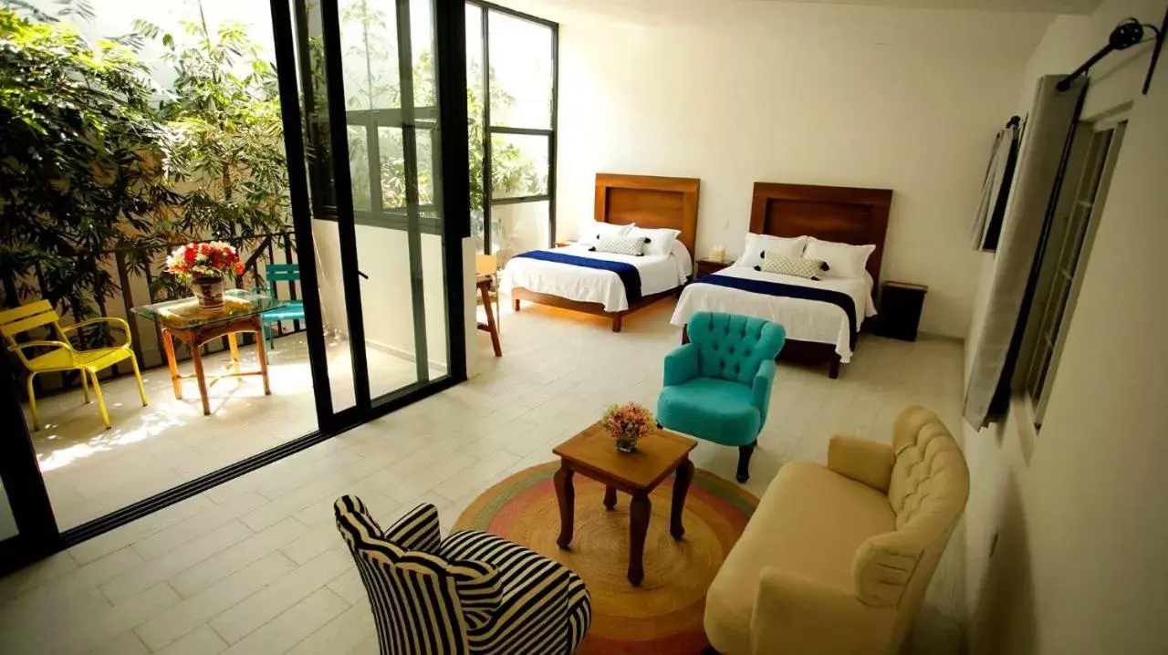 Photo of the whole room, Seating Area in Hotel La Casa de los Árboles Immersive Experience
