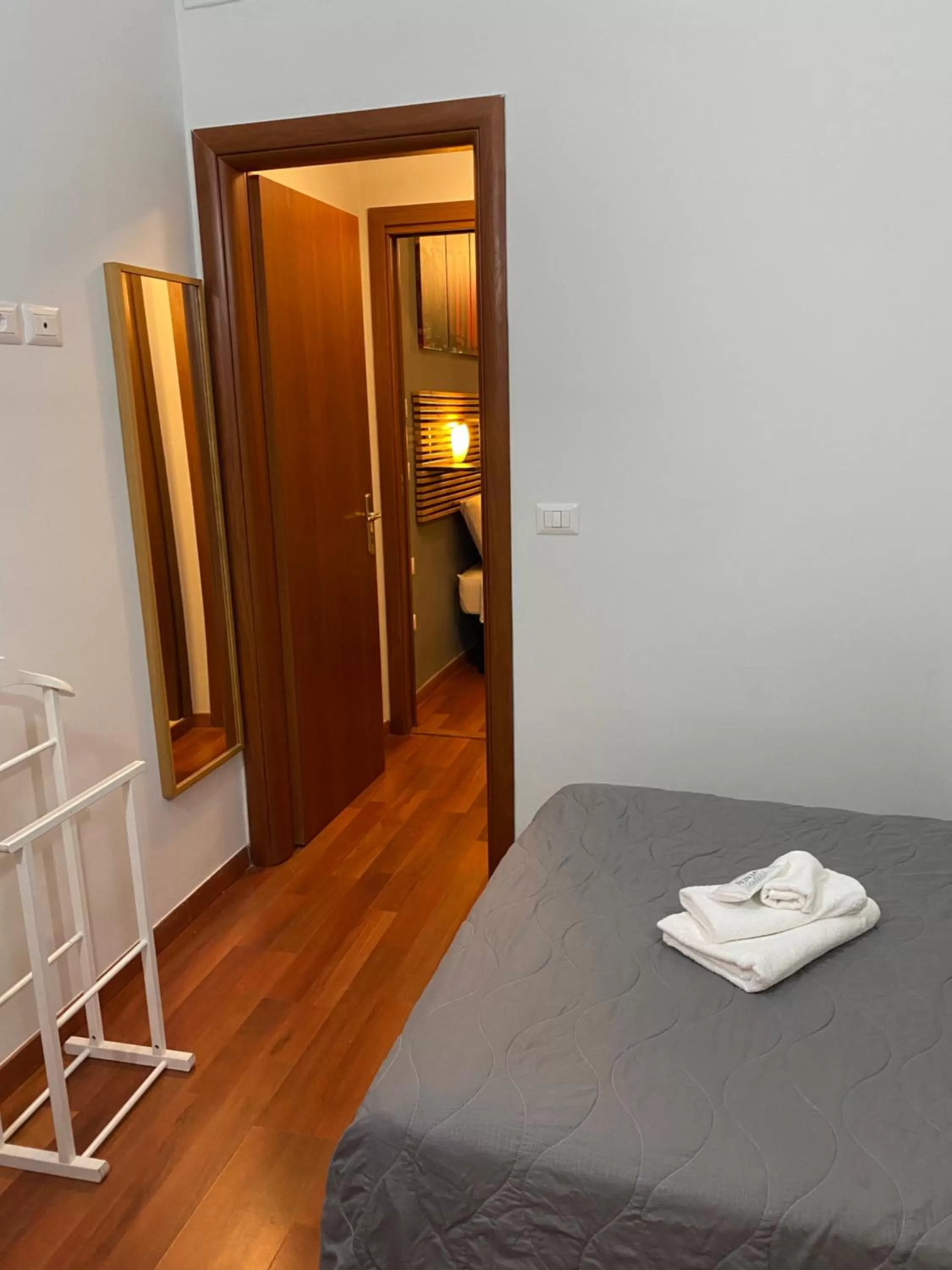 Bed in AmareRomaRooms