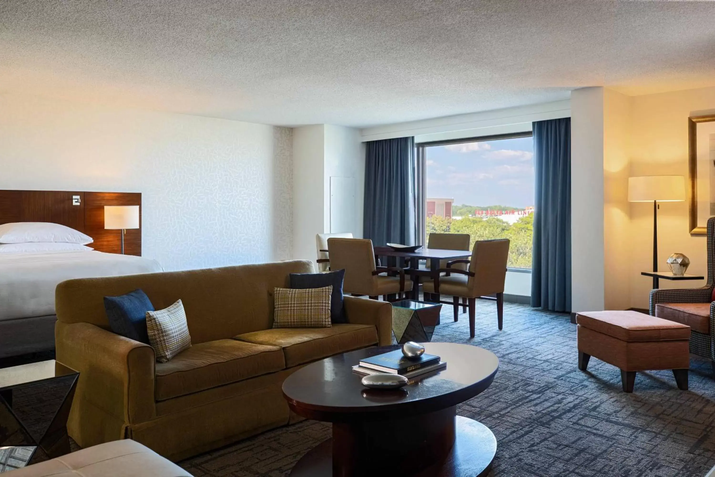 Bedroom, Seating Area in Renaissance Concourse Atlanta Airport Hotel