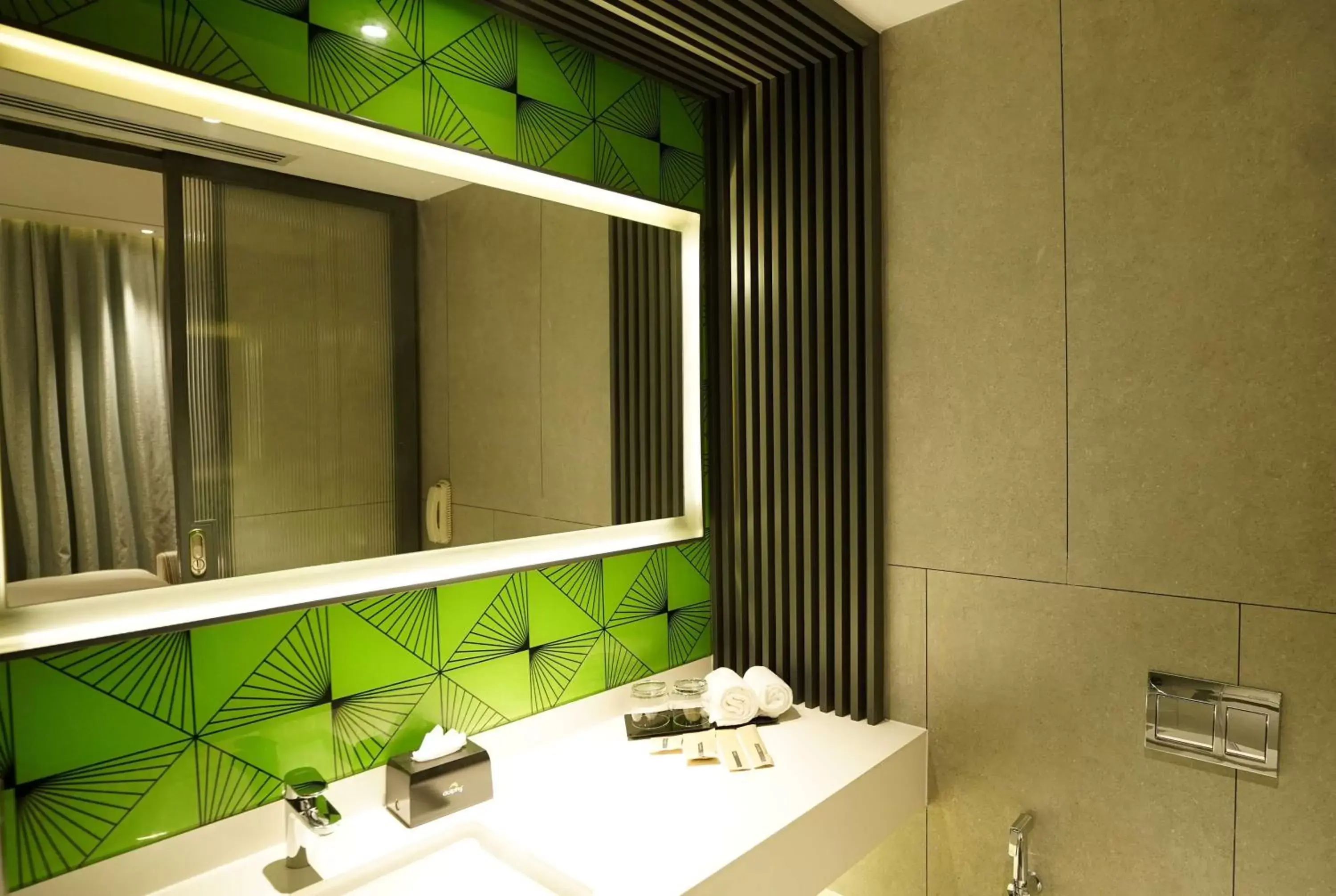 Photo of the whole room, Bathroom in Ramada Encore by Wyndham Bareilly Civil Lines