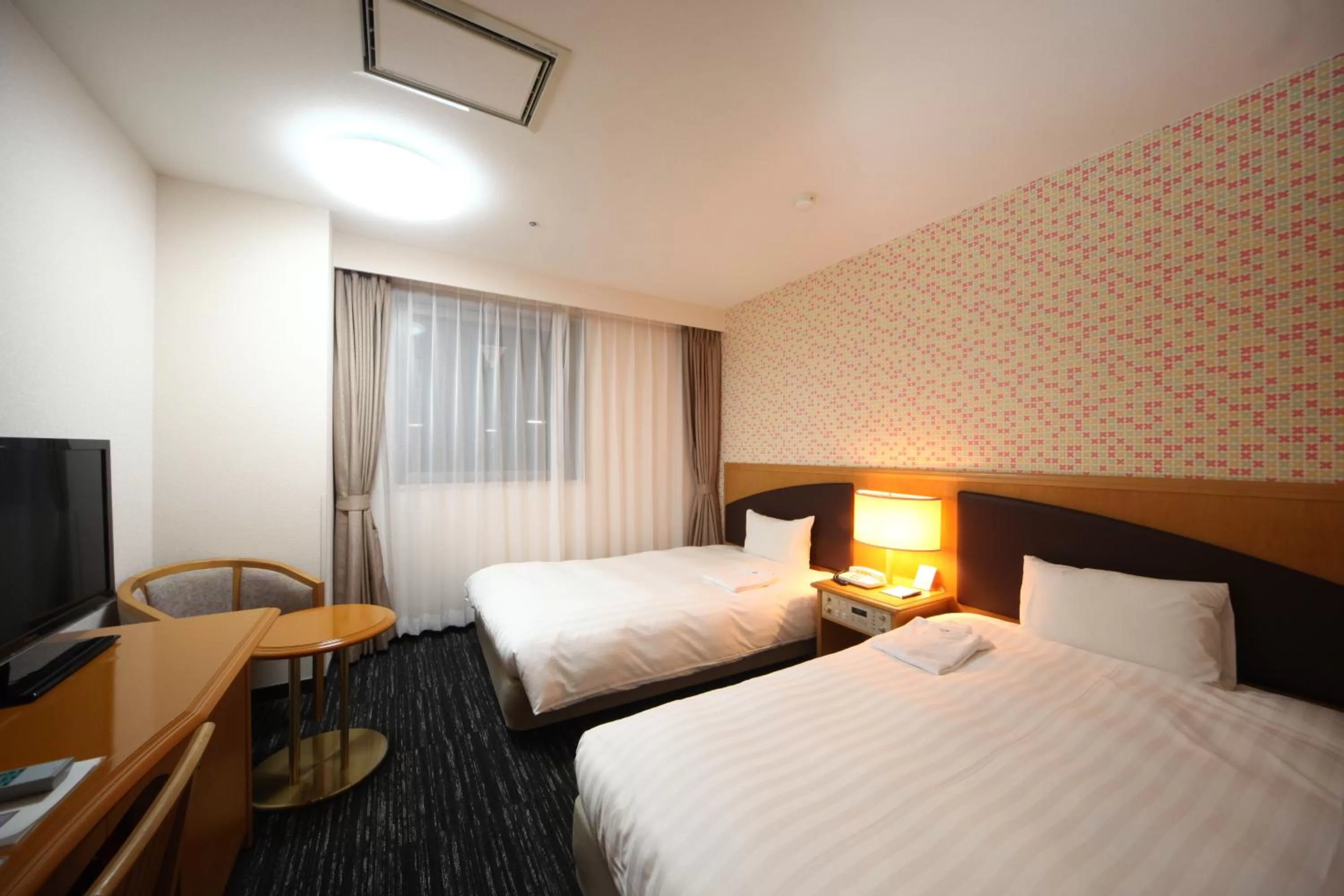 Photo of the whole room, Bed in Hotel Wing International Tomakomai