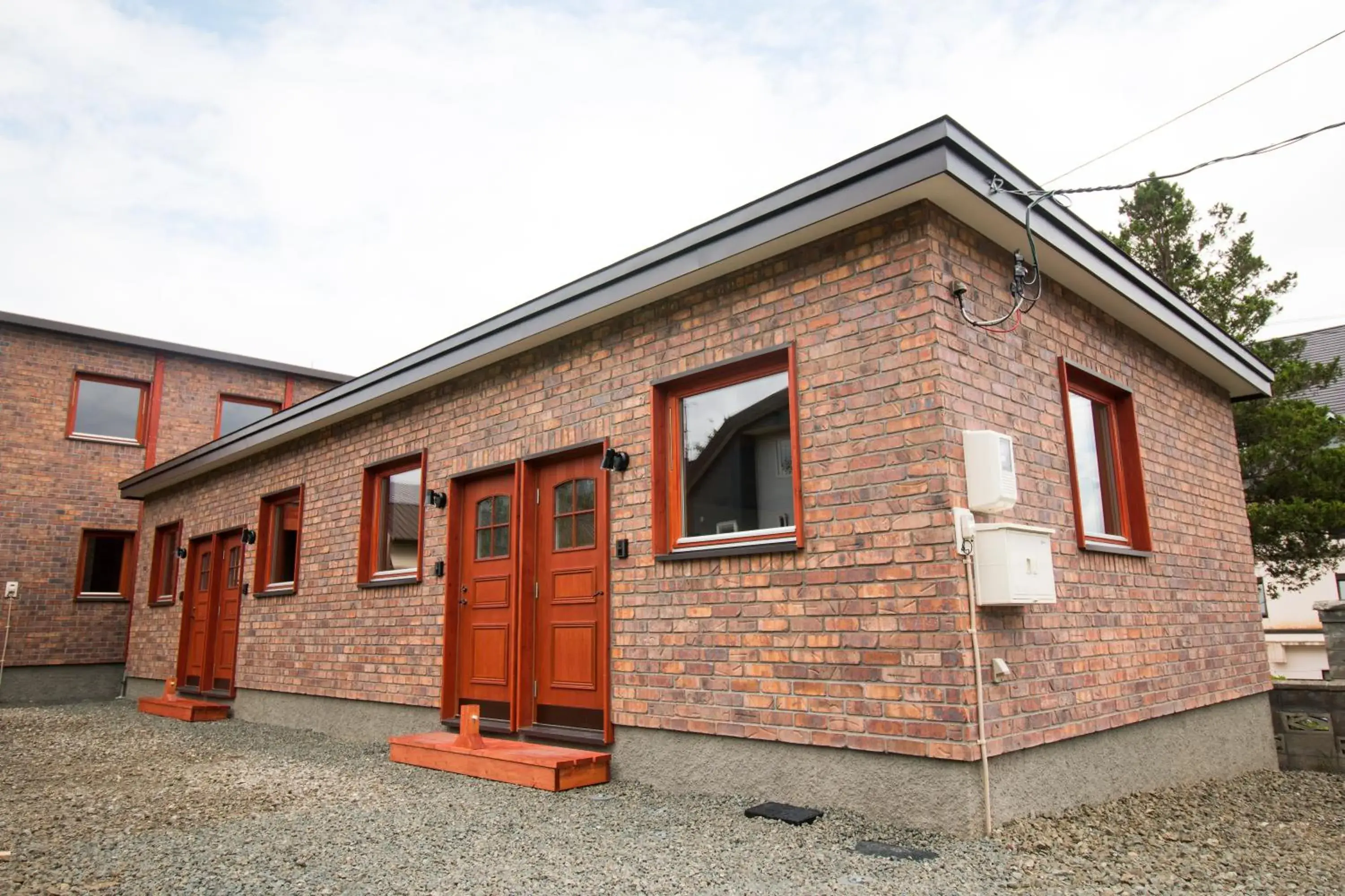 Facade/entrance, Property Building in Brick House Furano