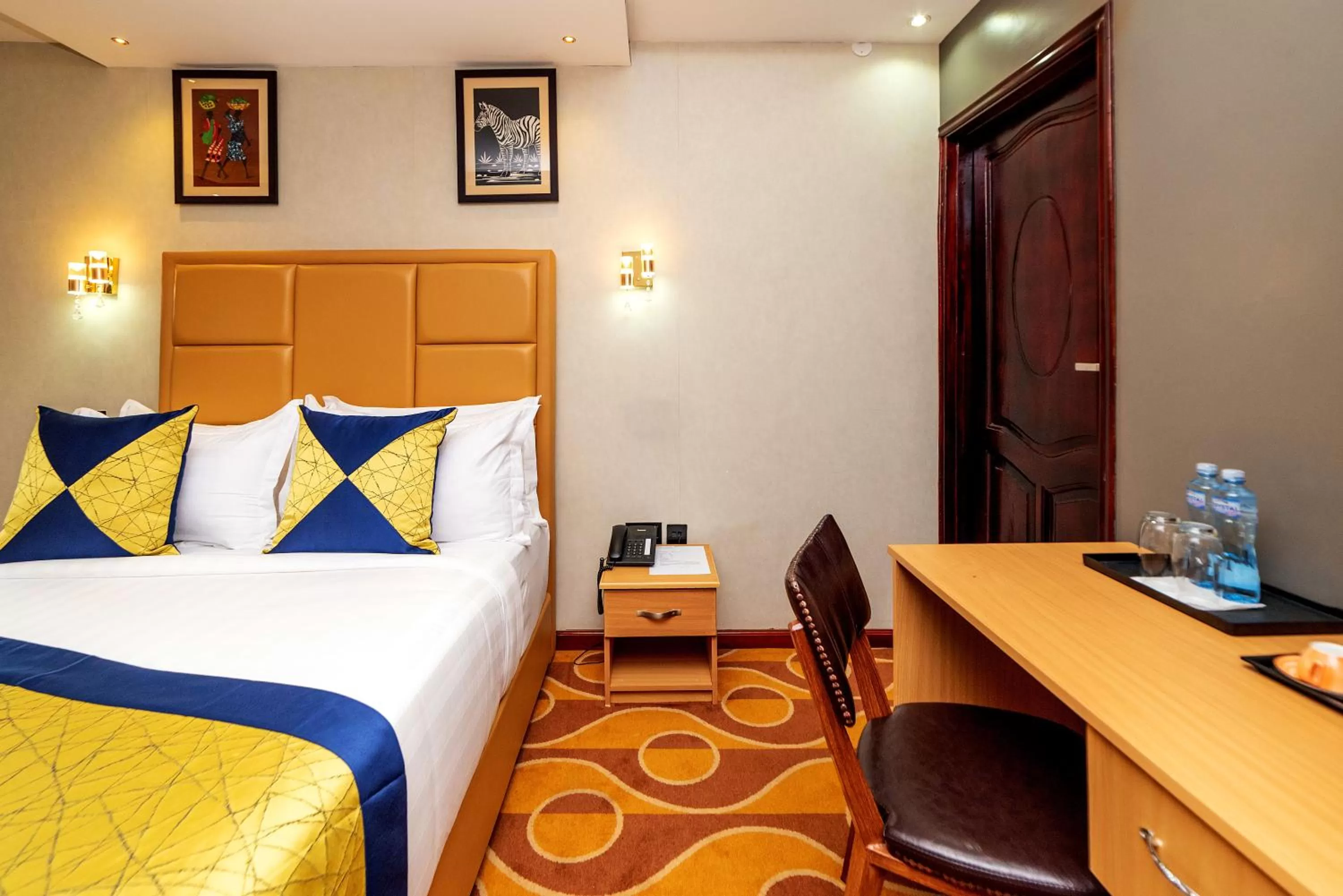 Bed in Afro Park Hotel