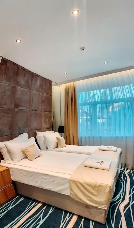 Bed in Hotel Vertigos