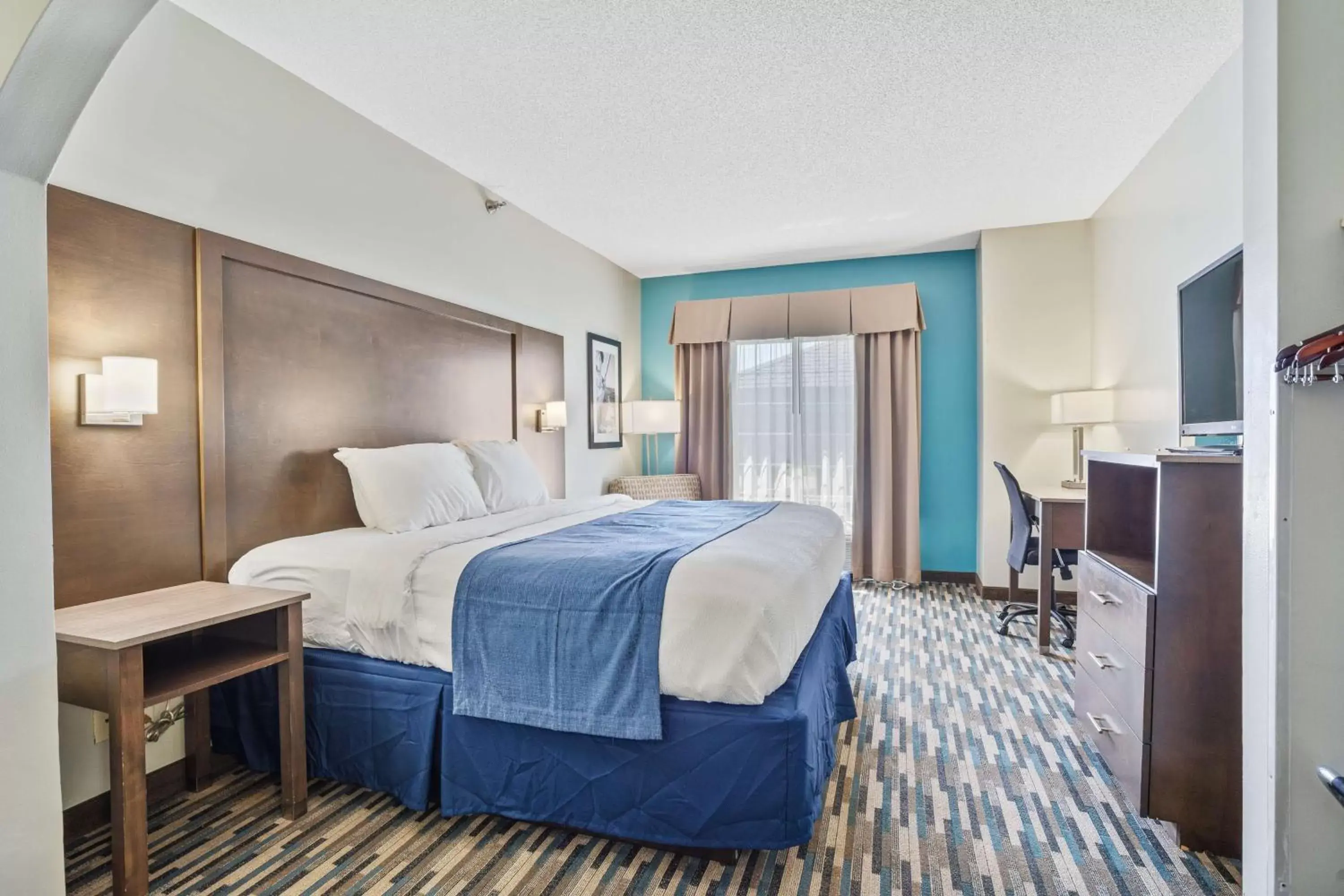 Bedroom, Bed in Blue Water Inn & Suites BW Signature Collection Bedroom, Bed in Blue Water Inn & Suites BW Signature Collection