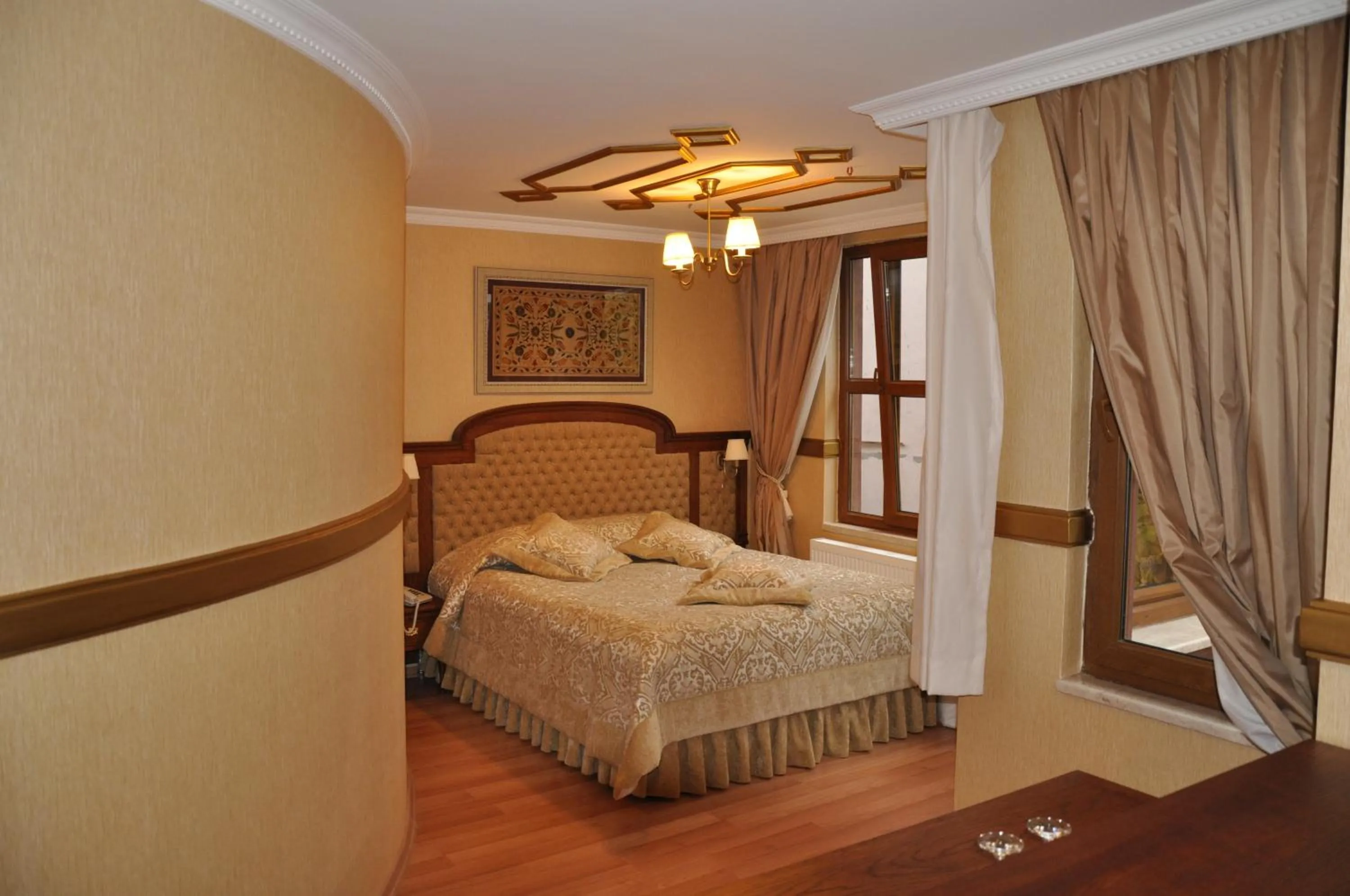 Bed in Aruna Boutique Hotel
