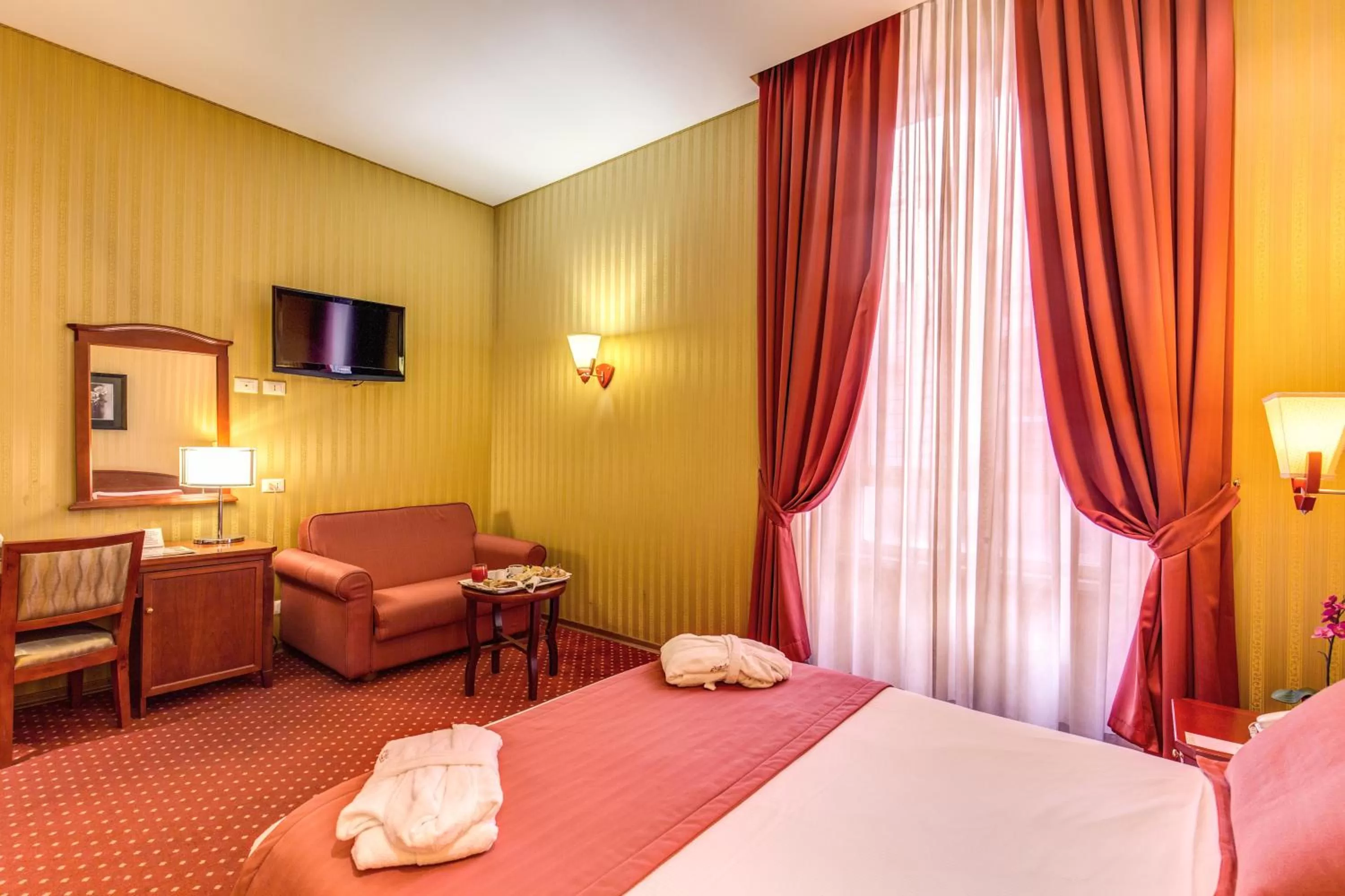 Photo of the whole room, Bed in Augusta Lucilla Palace