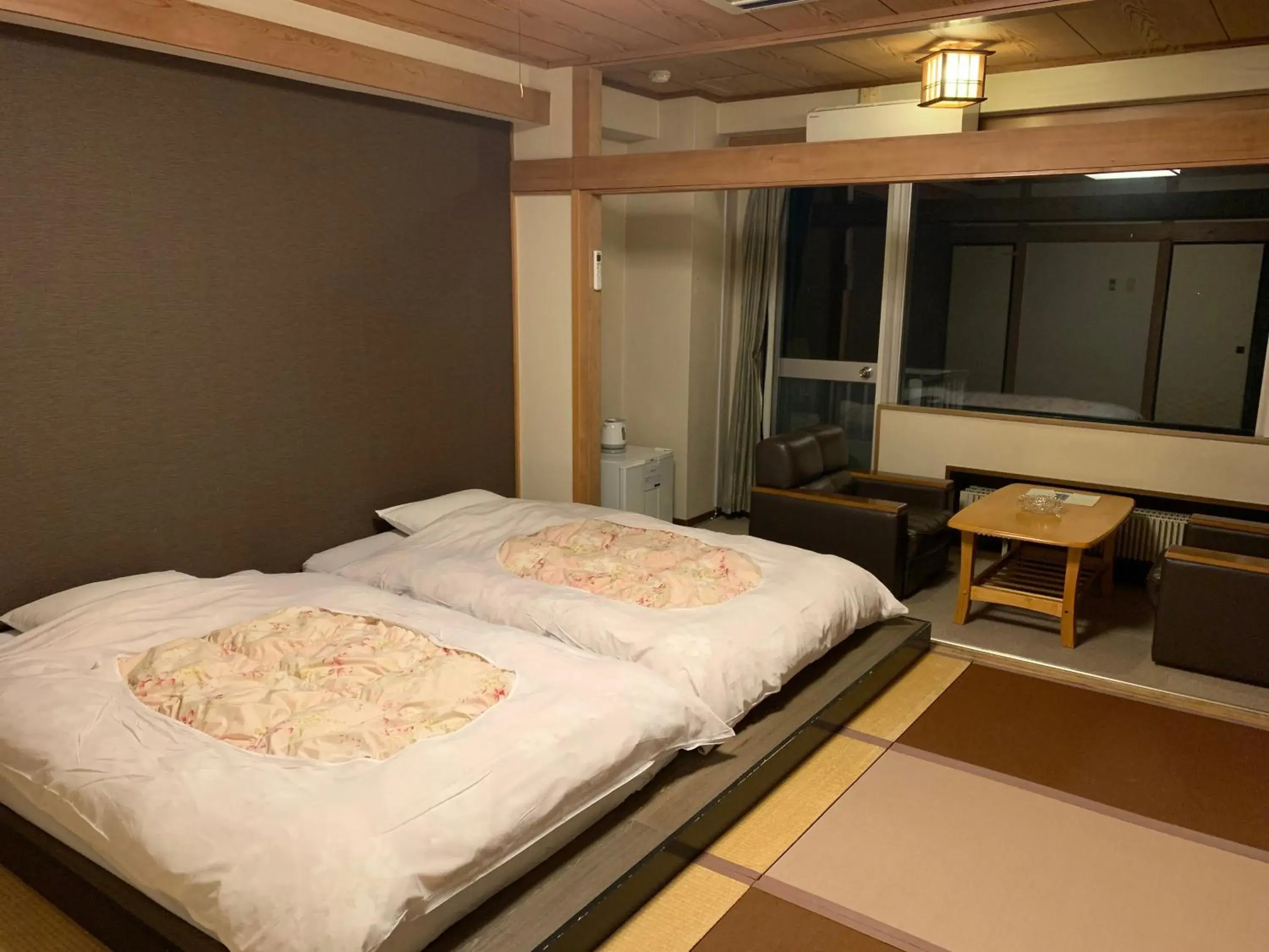 Bed in Granvillage Toya Daiwa Ryokan Annex