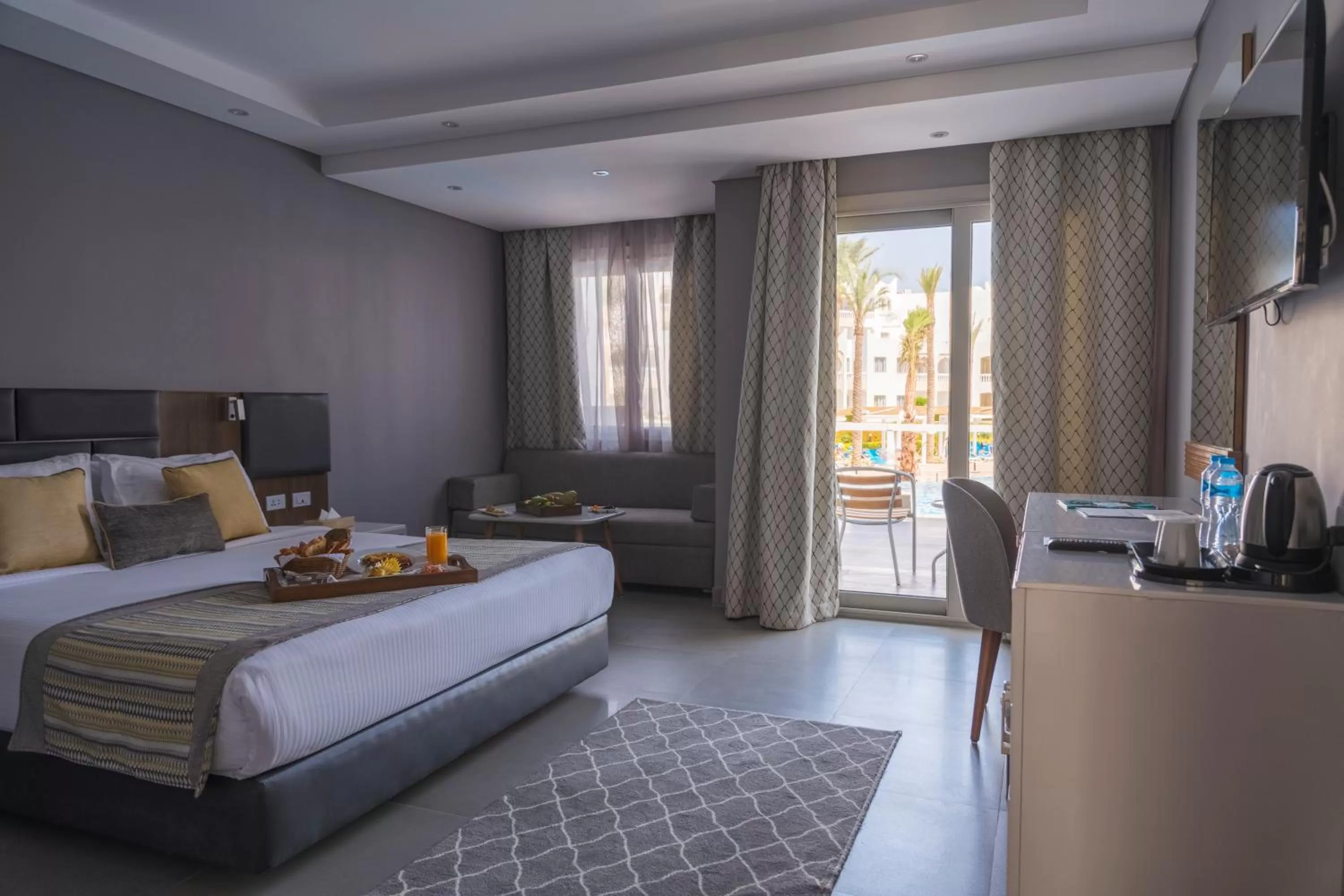 Bedroom, Bed in Sunrise Diamond Beach Resort -Grand Select