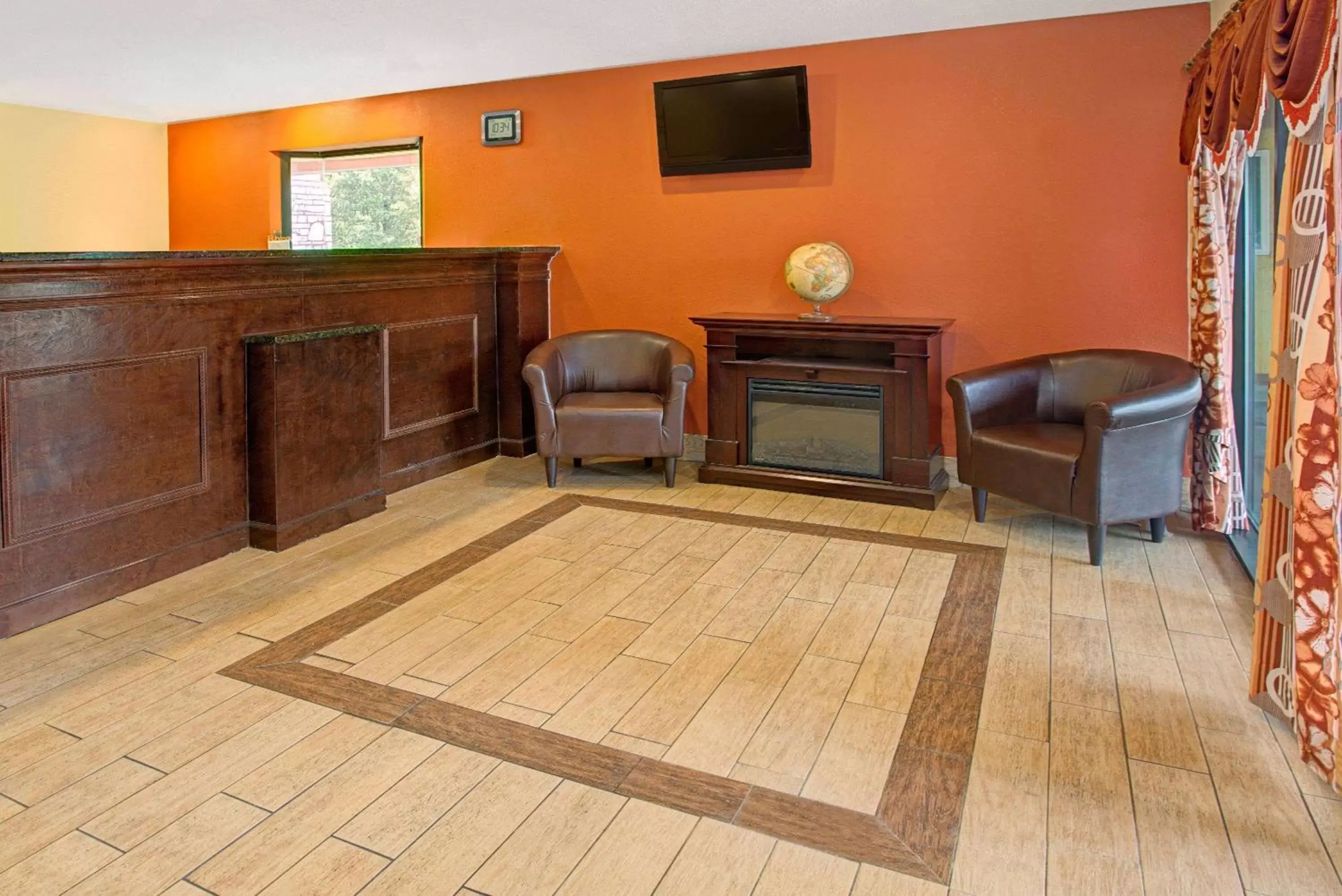 Lobby or reception in Super 8 by Wyndham Cincinnati-Springdale OH Lobby or reception in Super 8 by Wyndham Cincinnati-Springdale OH