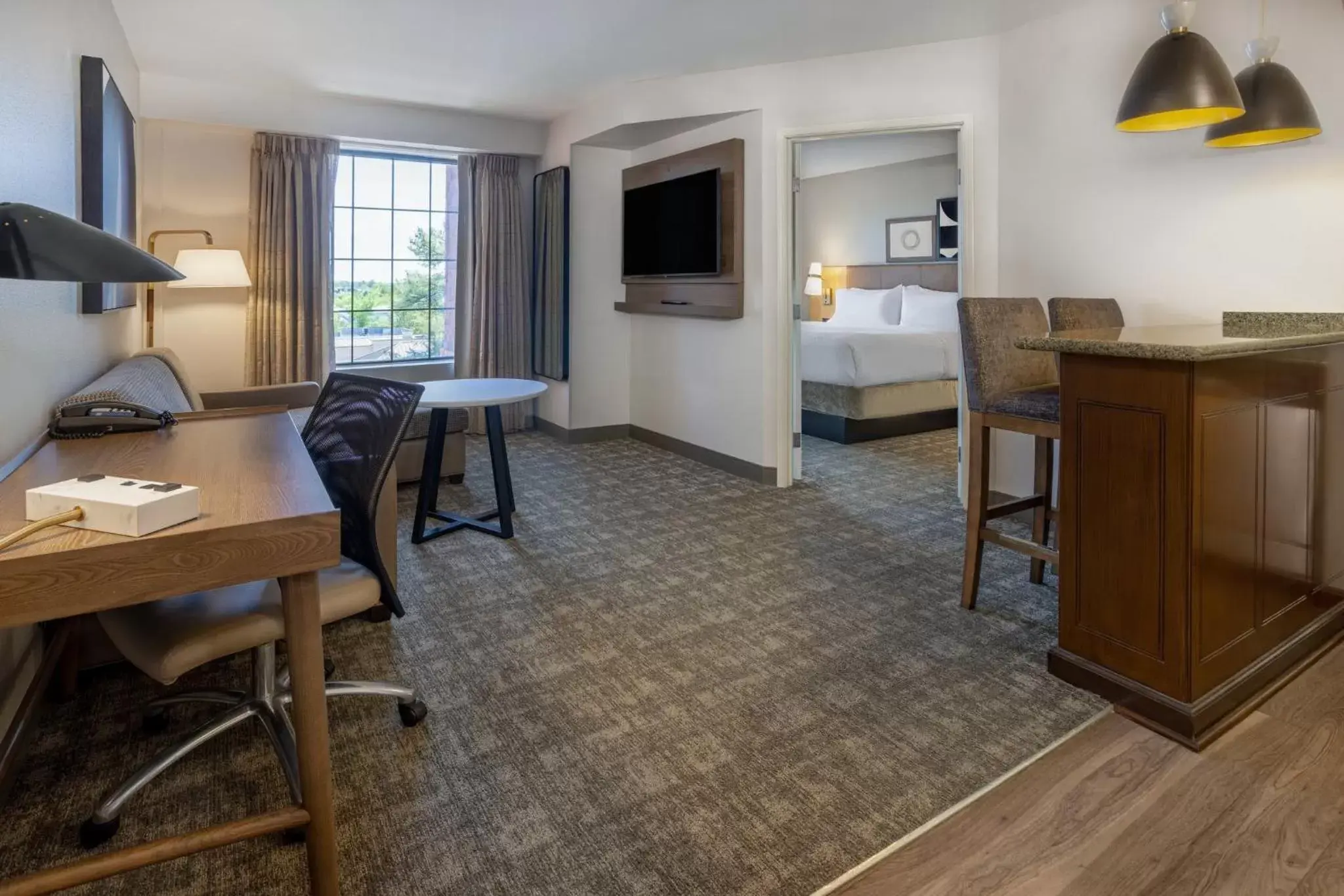 Photo of the whole room, Seating Area in Staybridge Suites Wilmington East, an IHG Hotel