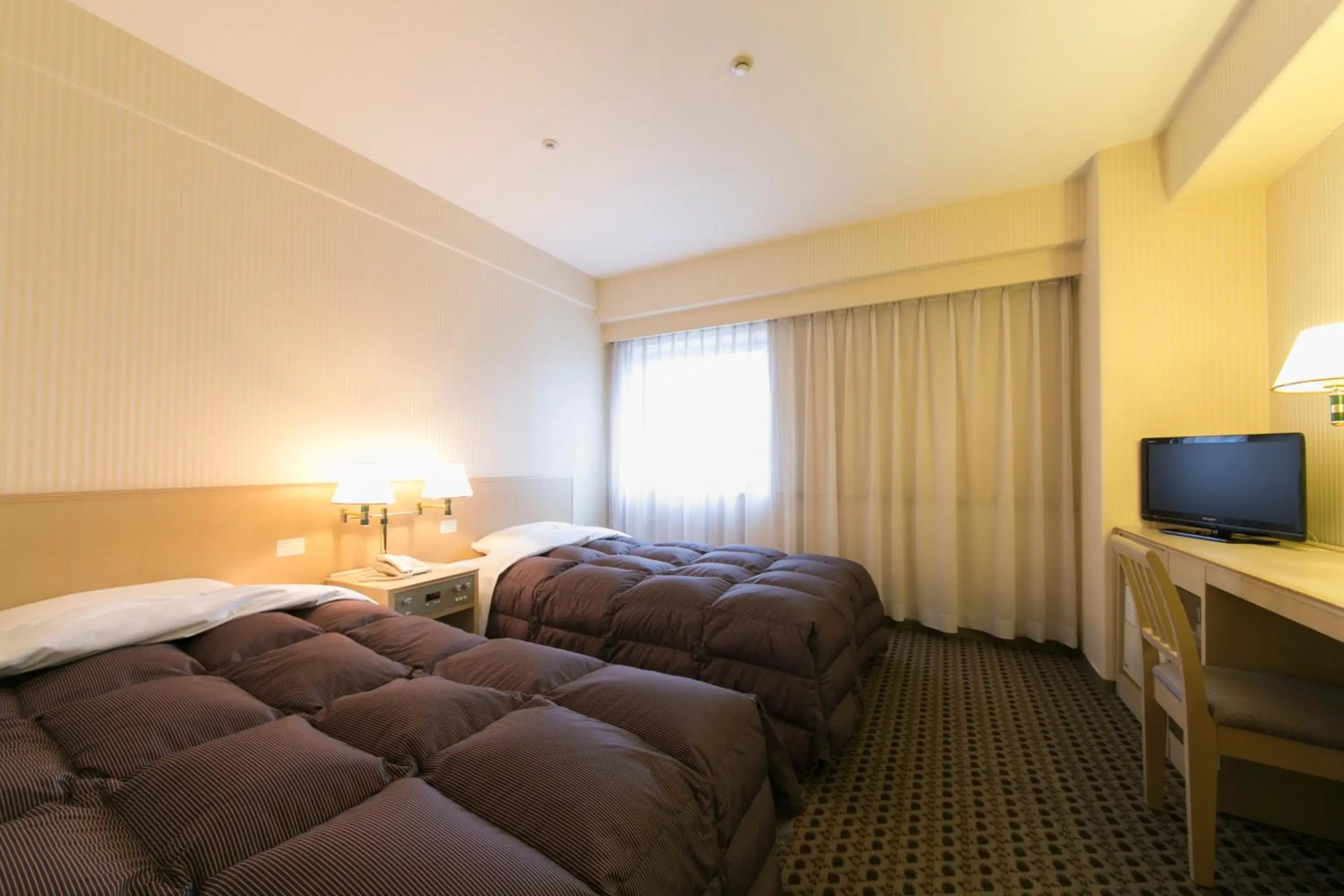 Photo of the whole room, Bed in Yonago Washington Hotel Plaza