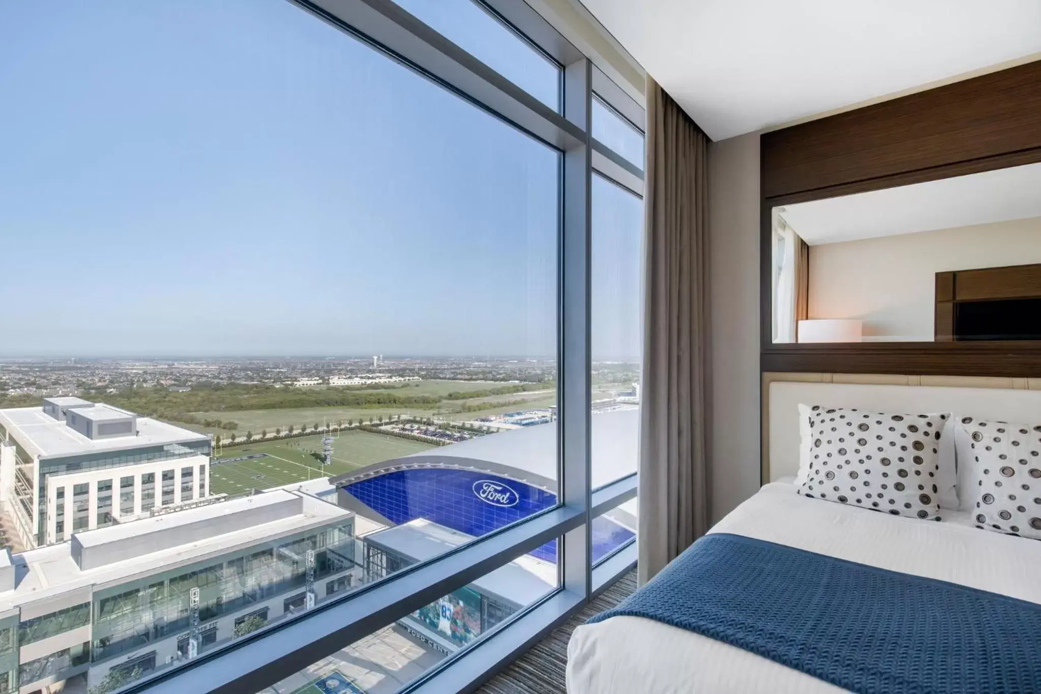 Photo of the whole room, Pool View in Omni Frisco at The Star