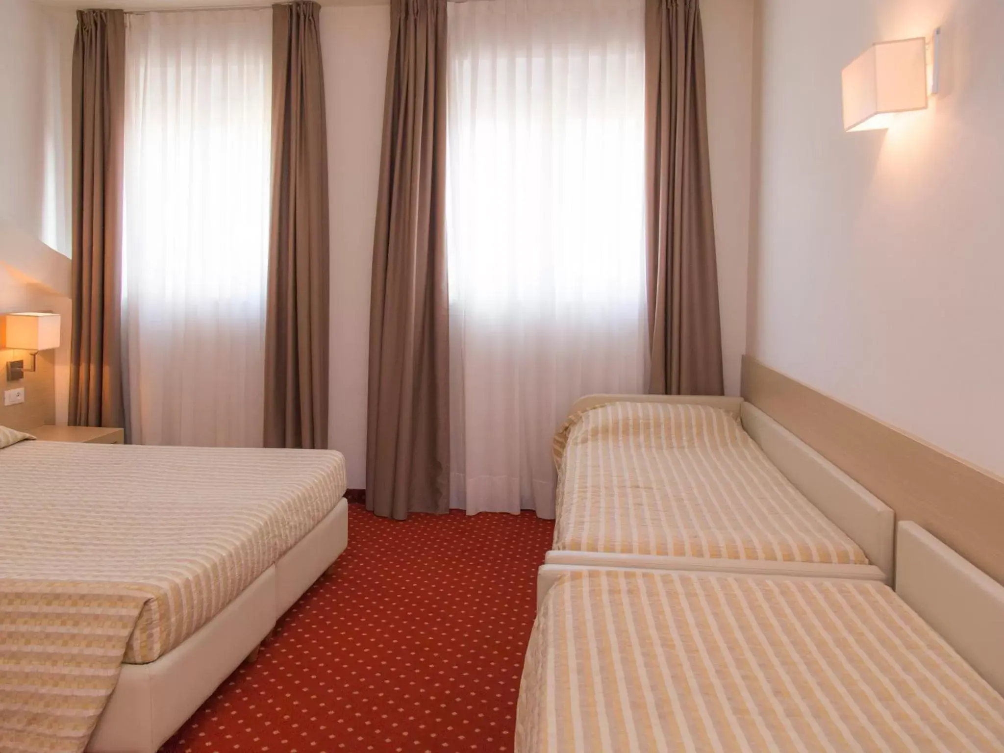 Bed, Room Photo in Hotel Regina