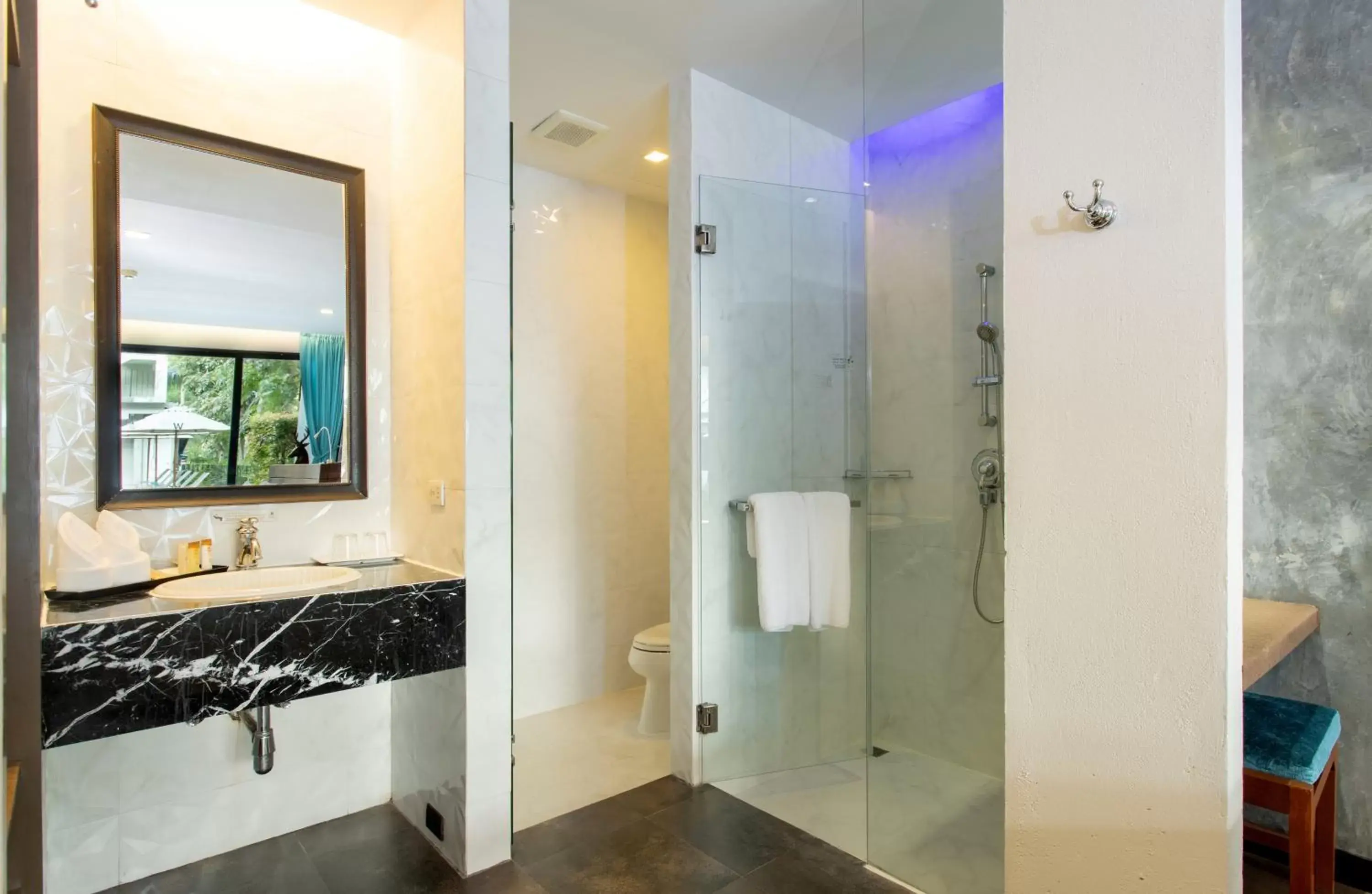 Bathroom in The Waters Khao Lak by Katathani - SHA Extra Plus