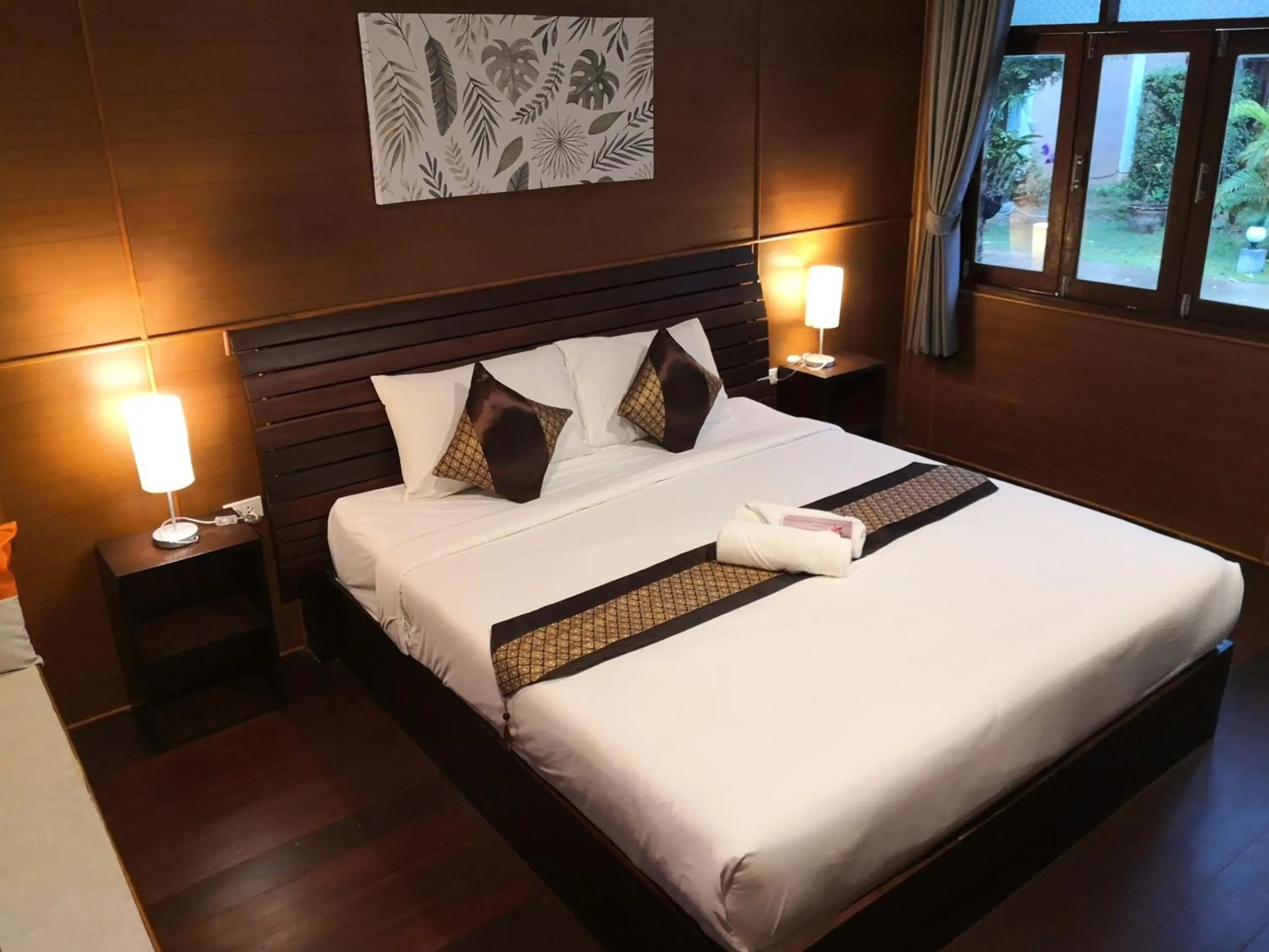Bed in Baan Suan Rim Klong