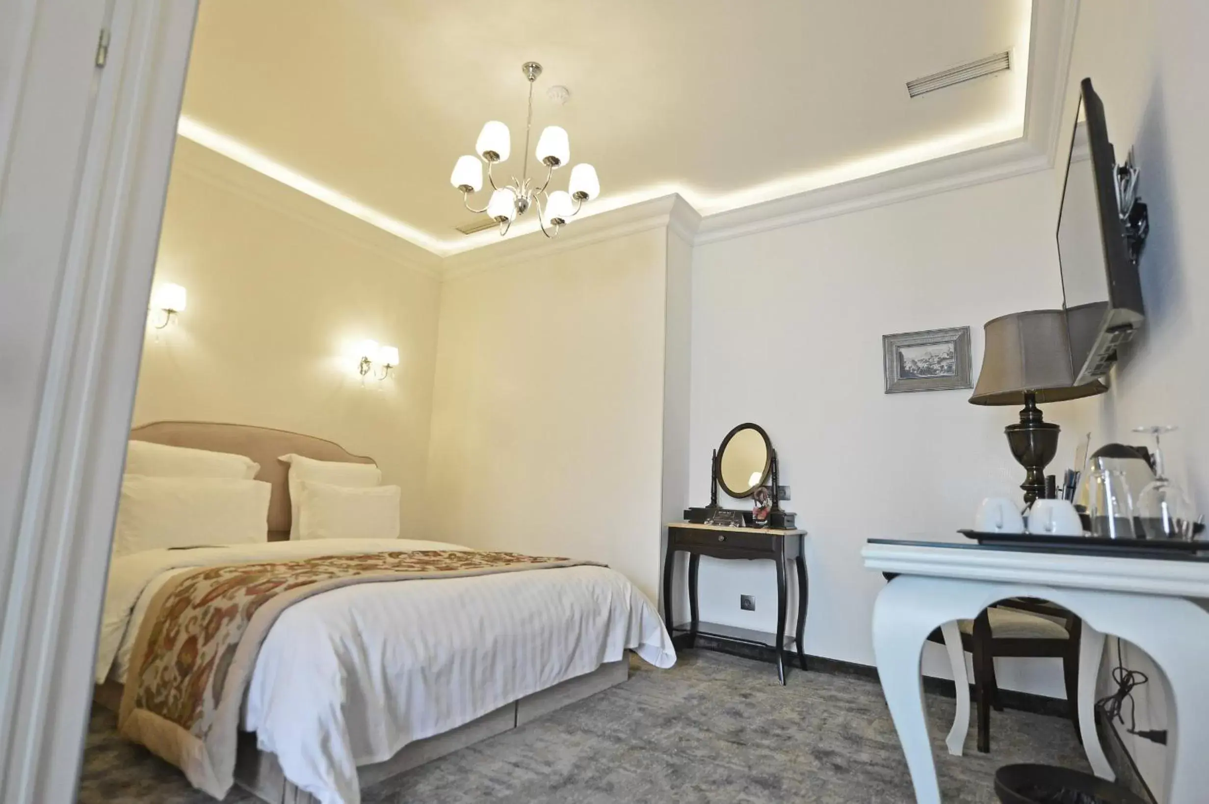 Bed in Ambassadori Tbilisi Hotel
