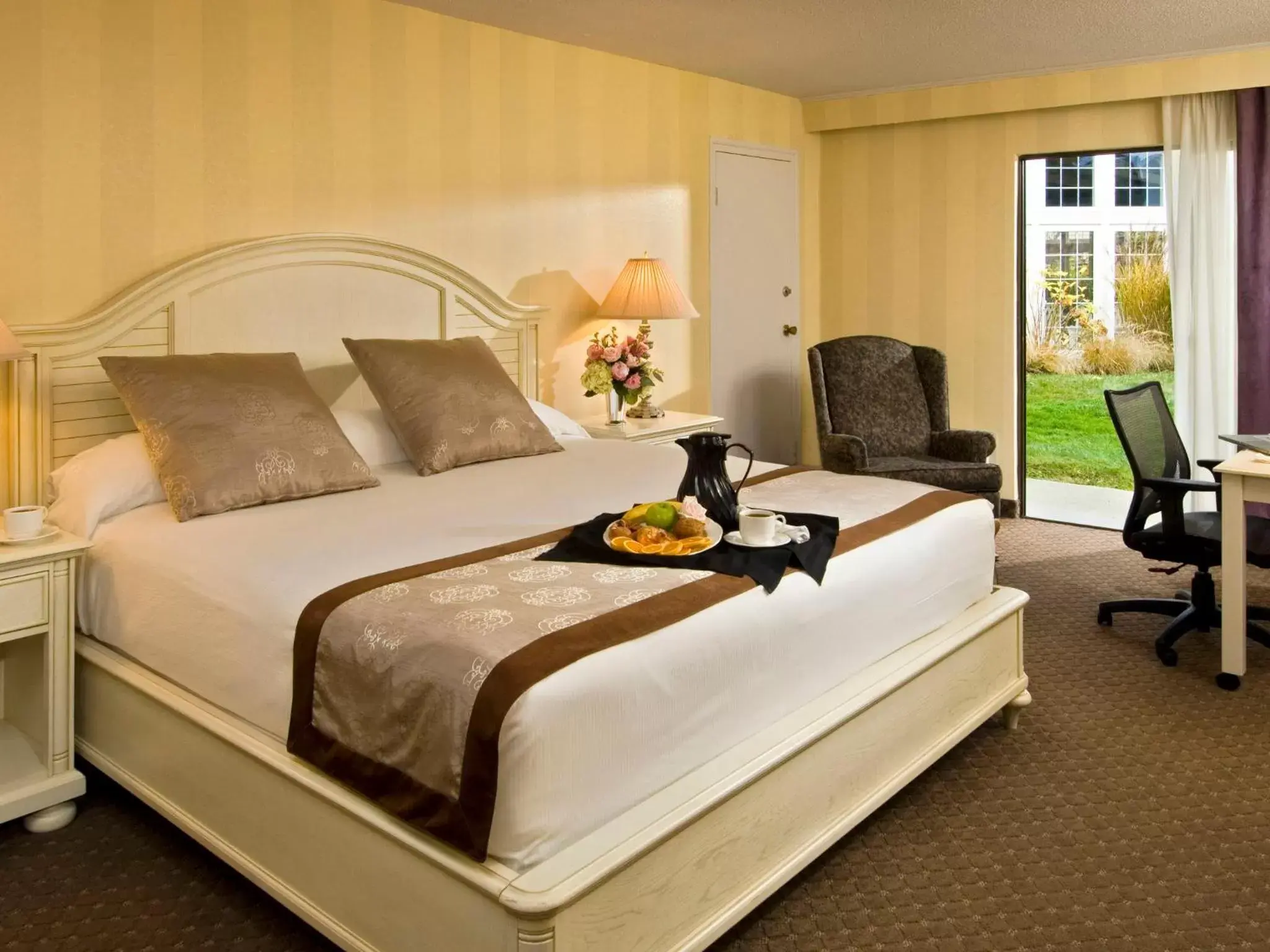 Bed in Cape Codder Resort & Spa