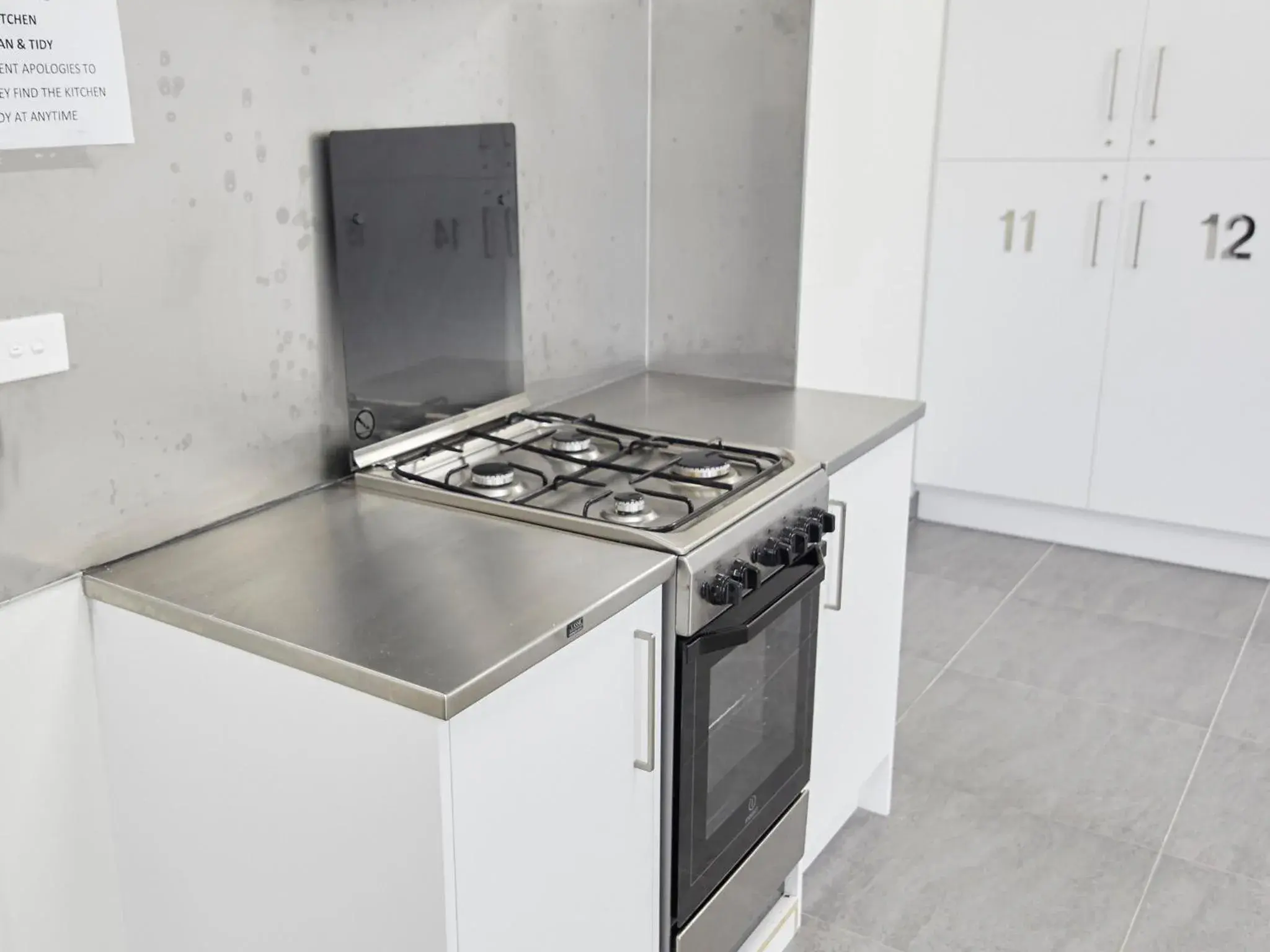 Property building, Kitchen/Kitchenette in Three Palms Lodge