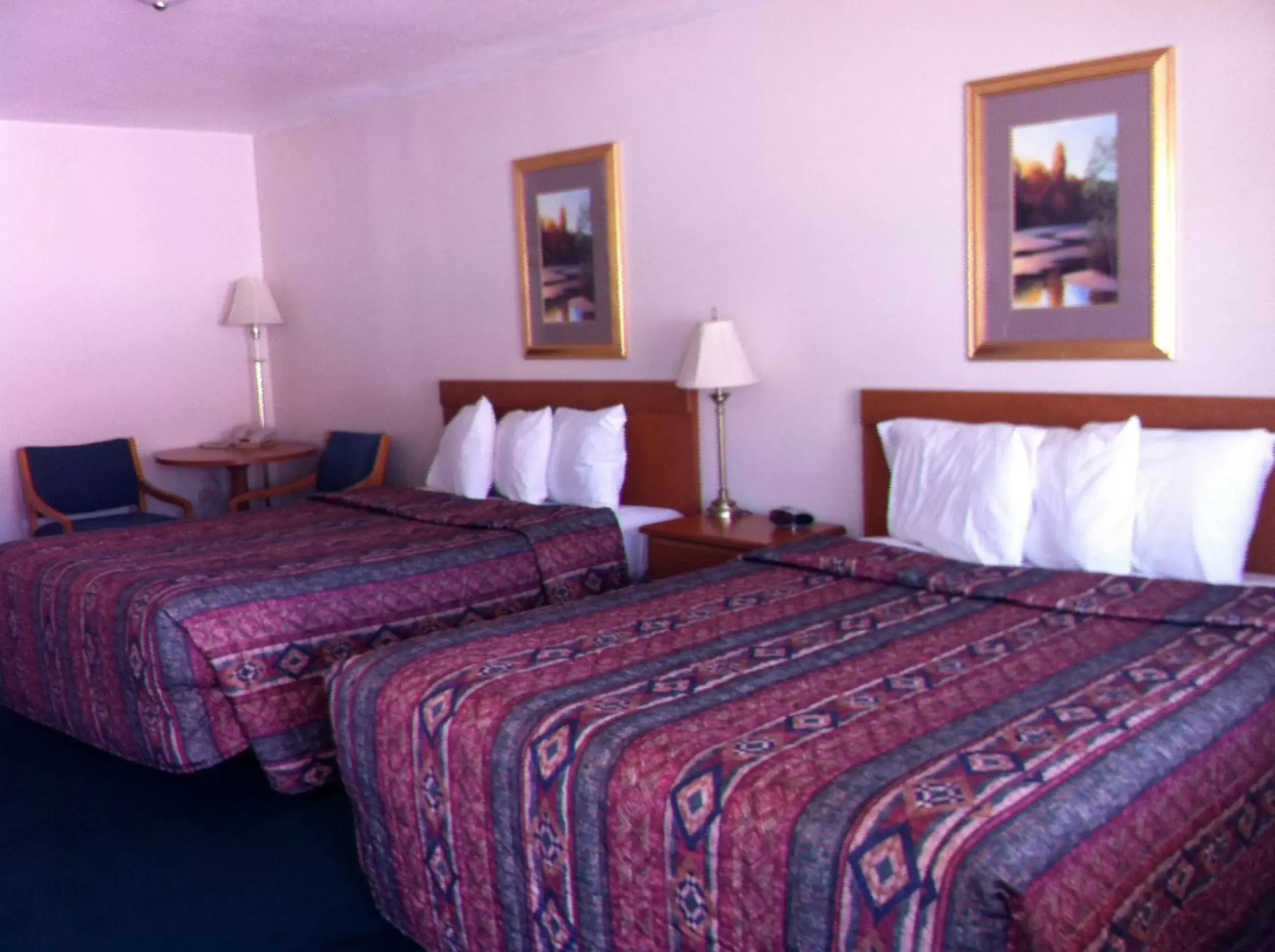 Photo of the whole room, Bed in Legacy Inn