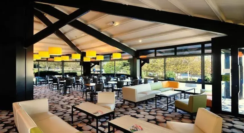 Communal lounge/ TV room, Restaurant/Places to Eat in Relais Fasthotel Port Lauragais
