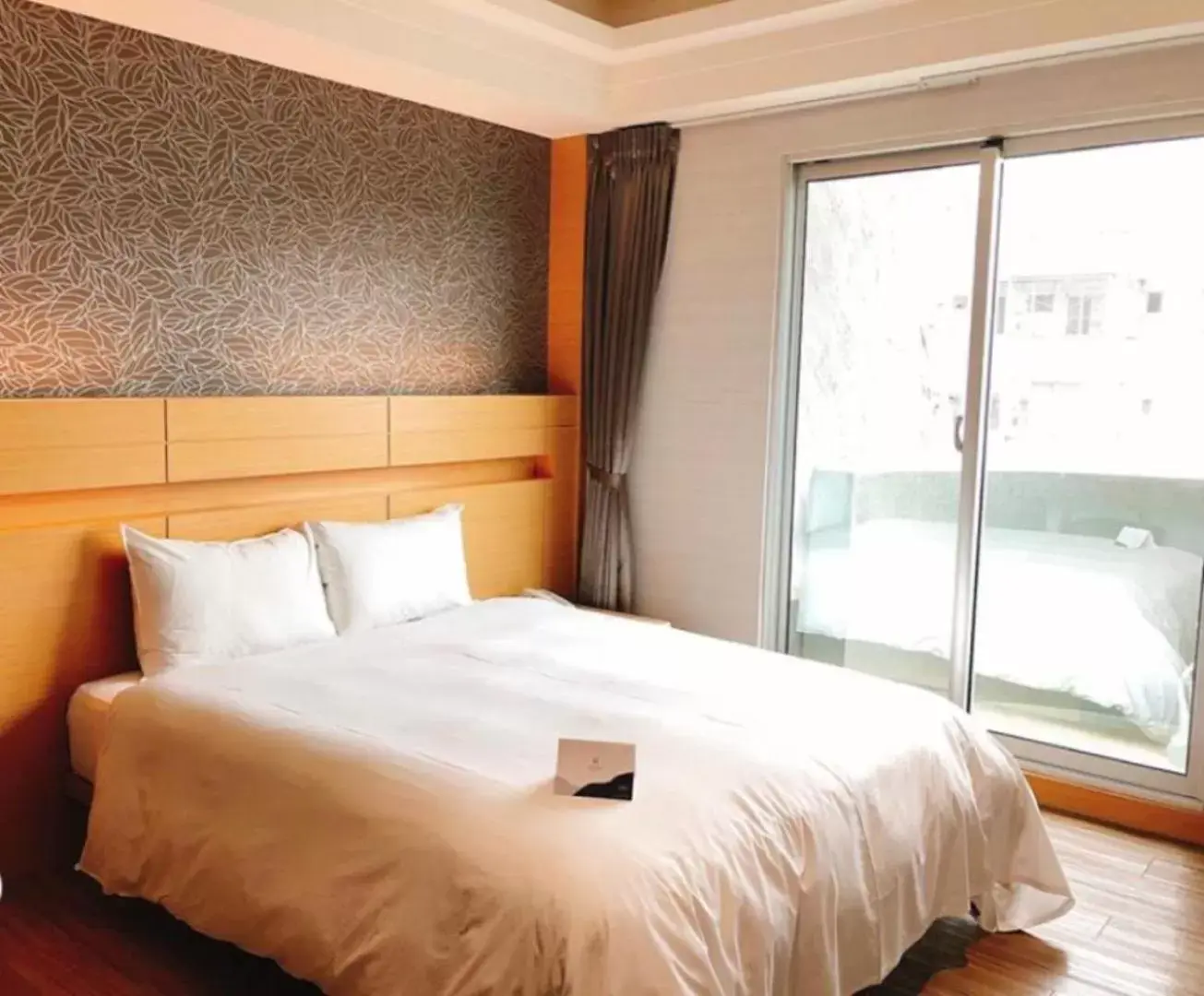 Bed in Talmud Hotel Tainan