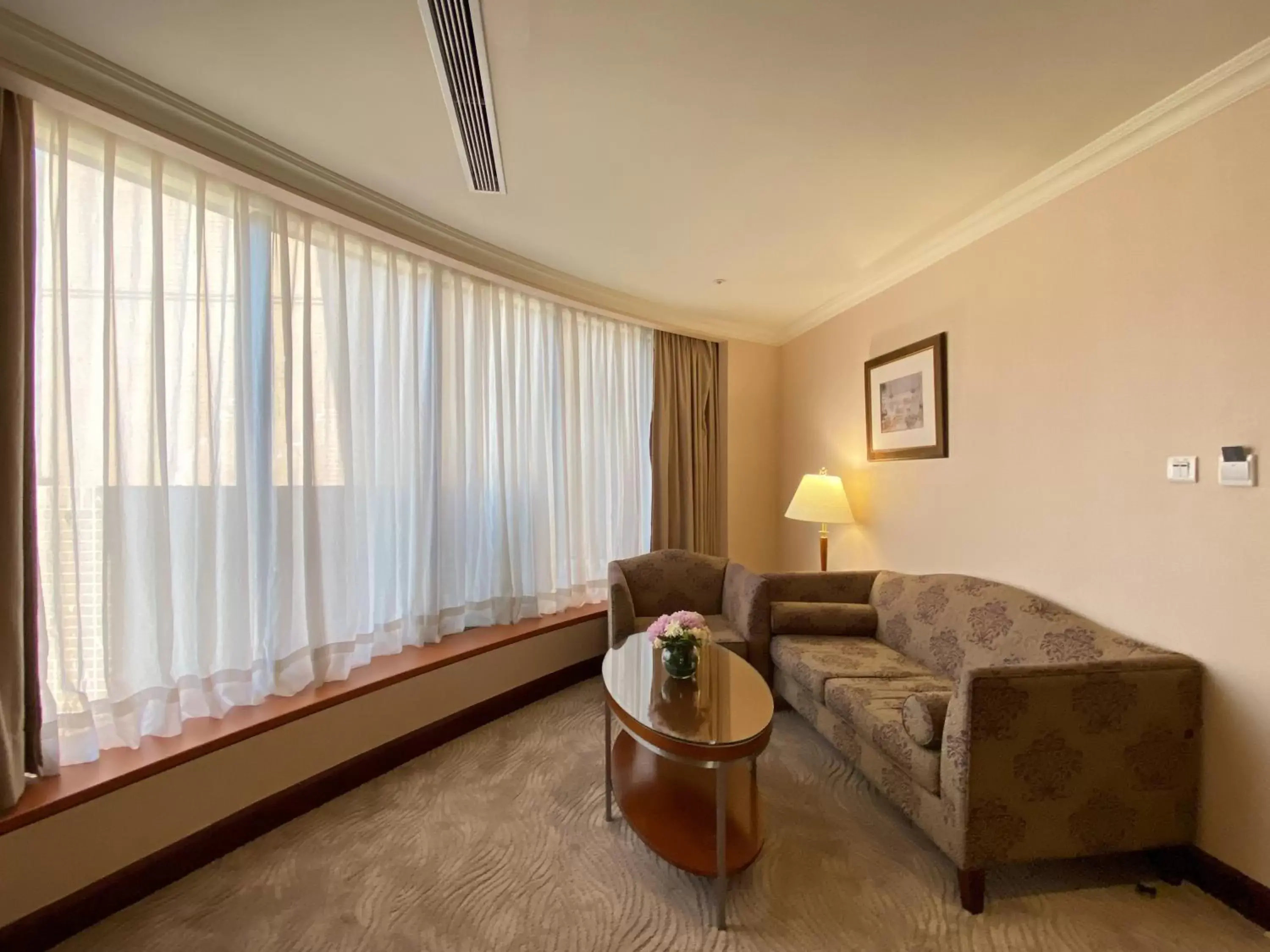 Living room, Seating Area in Monarch Plaza Hotel