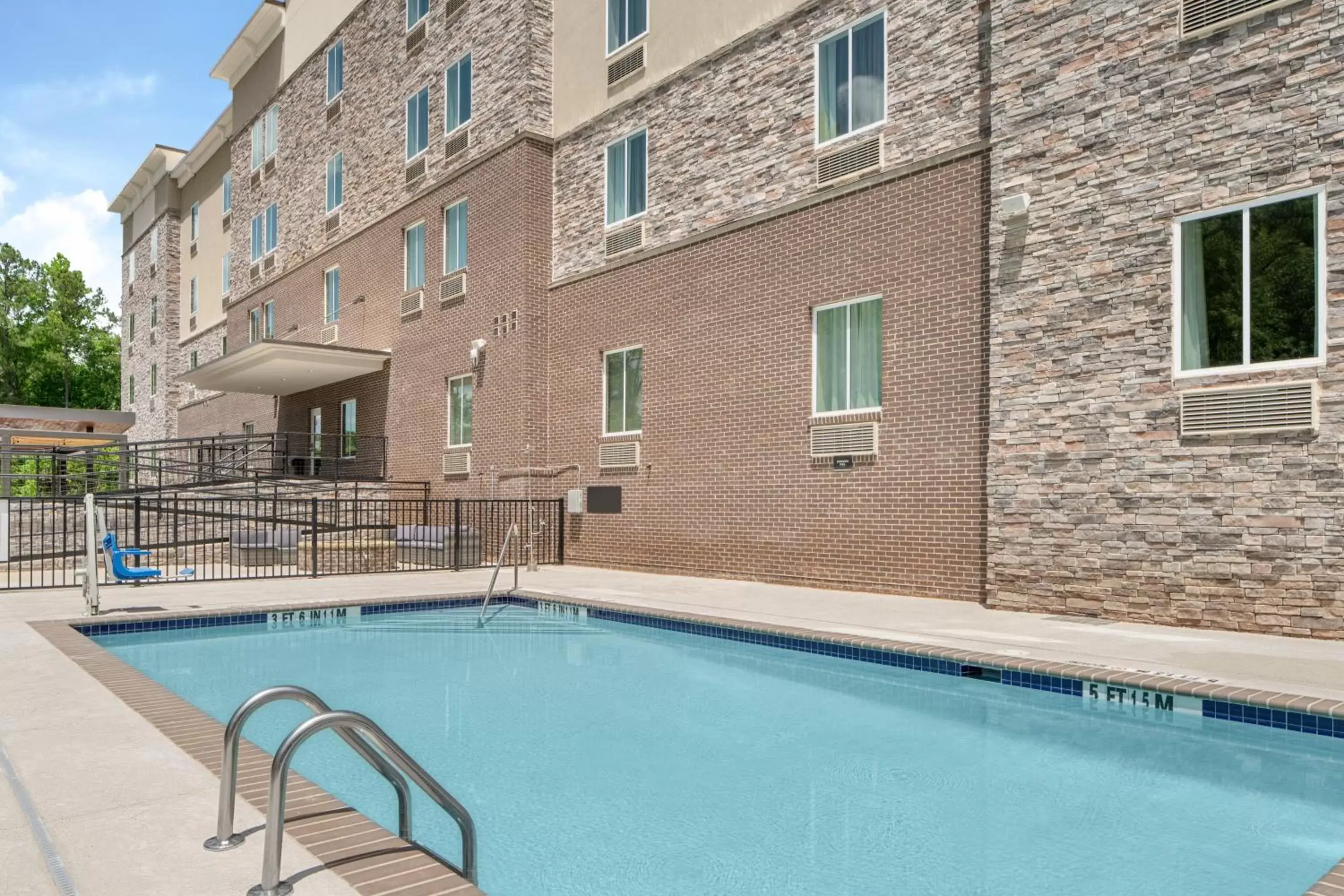 Swimming pool, Property Building in Candlewood Suites - Newnan - Atlanta SW, an IHG Hotel
