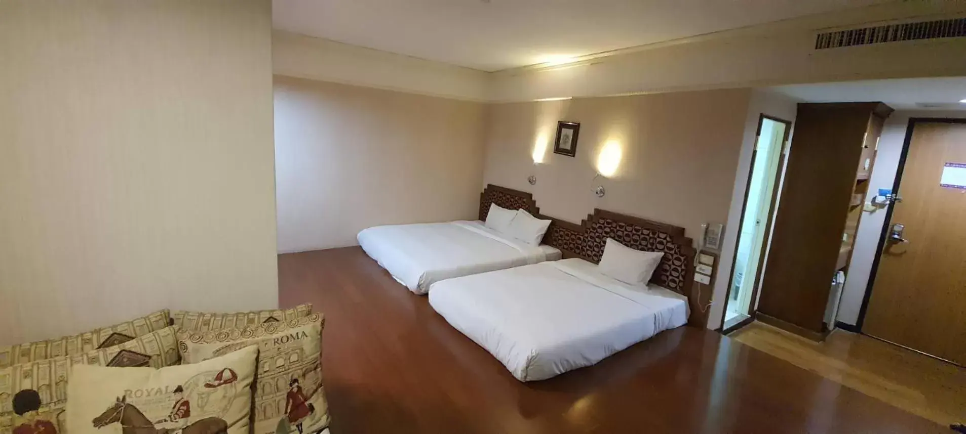 Bed in Tapeng Bay Holiday Hotel