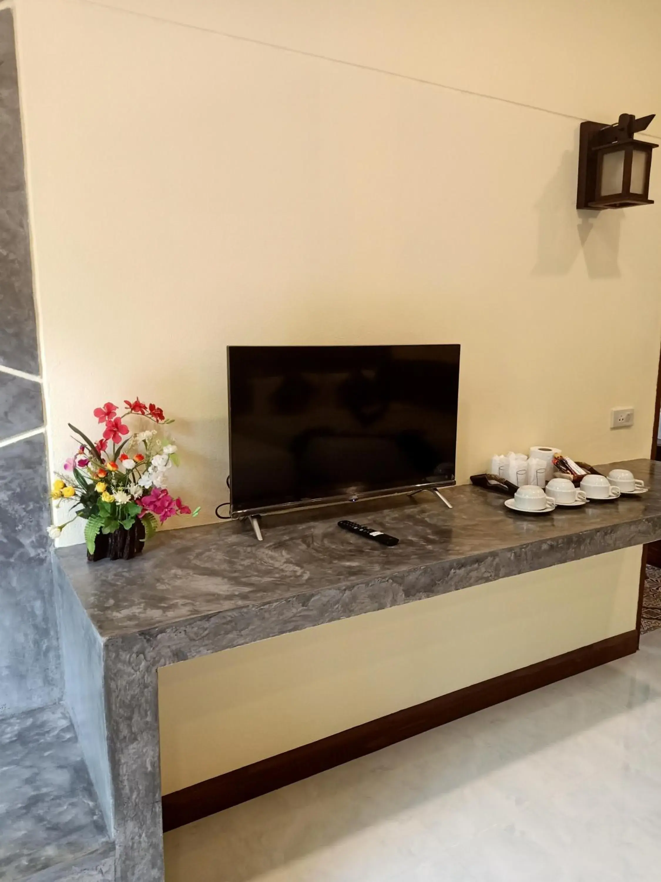 TV and multimedia, TV/Entertainment Center in Lanta Pearl Beach Resort