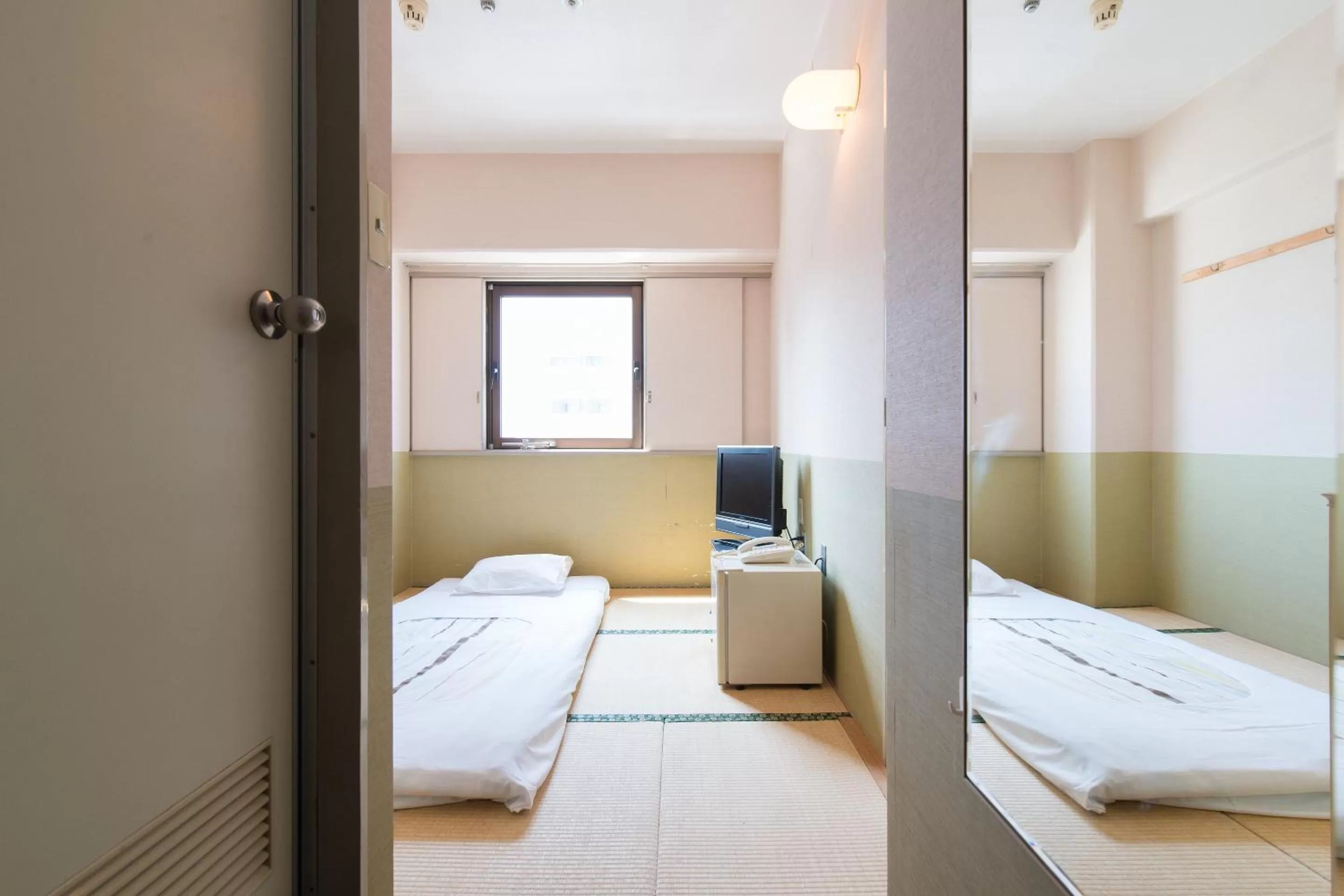 Photo of the whole room, Bed in Tabist Hotel Tetora Kitakyushu