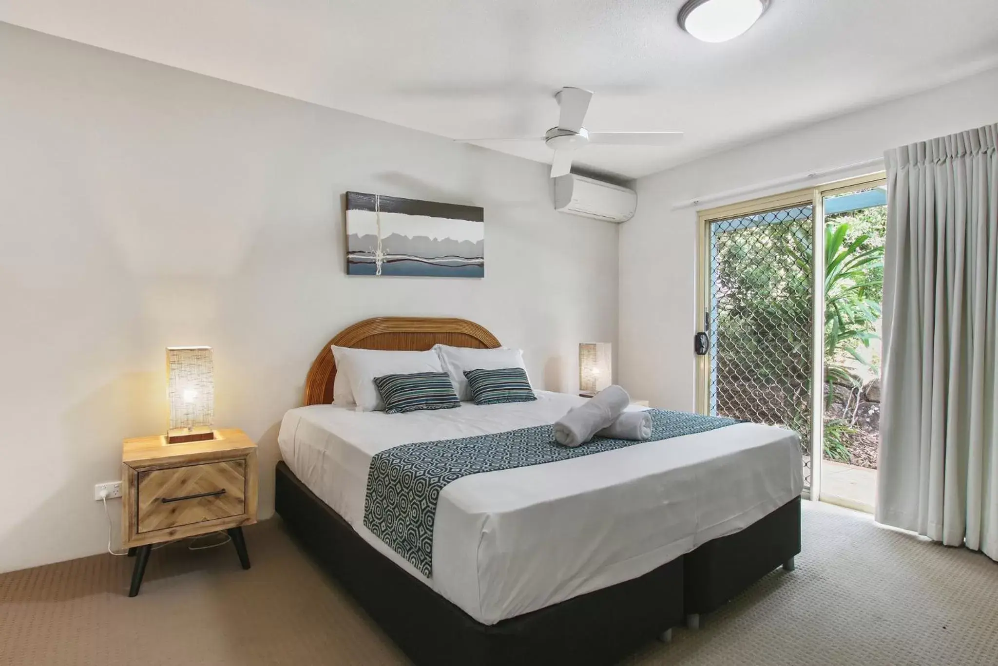 Bed in Lennox Beach Resort
