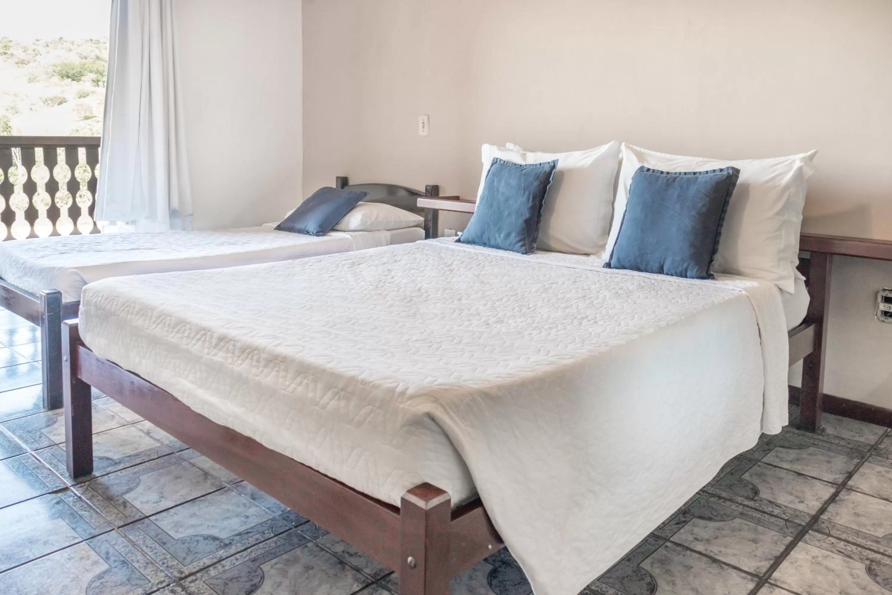 Bed in Pousada dos Coqueiros Búzios