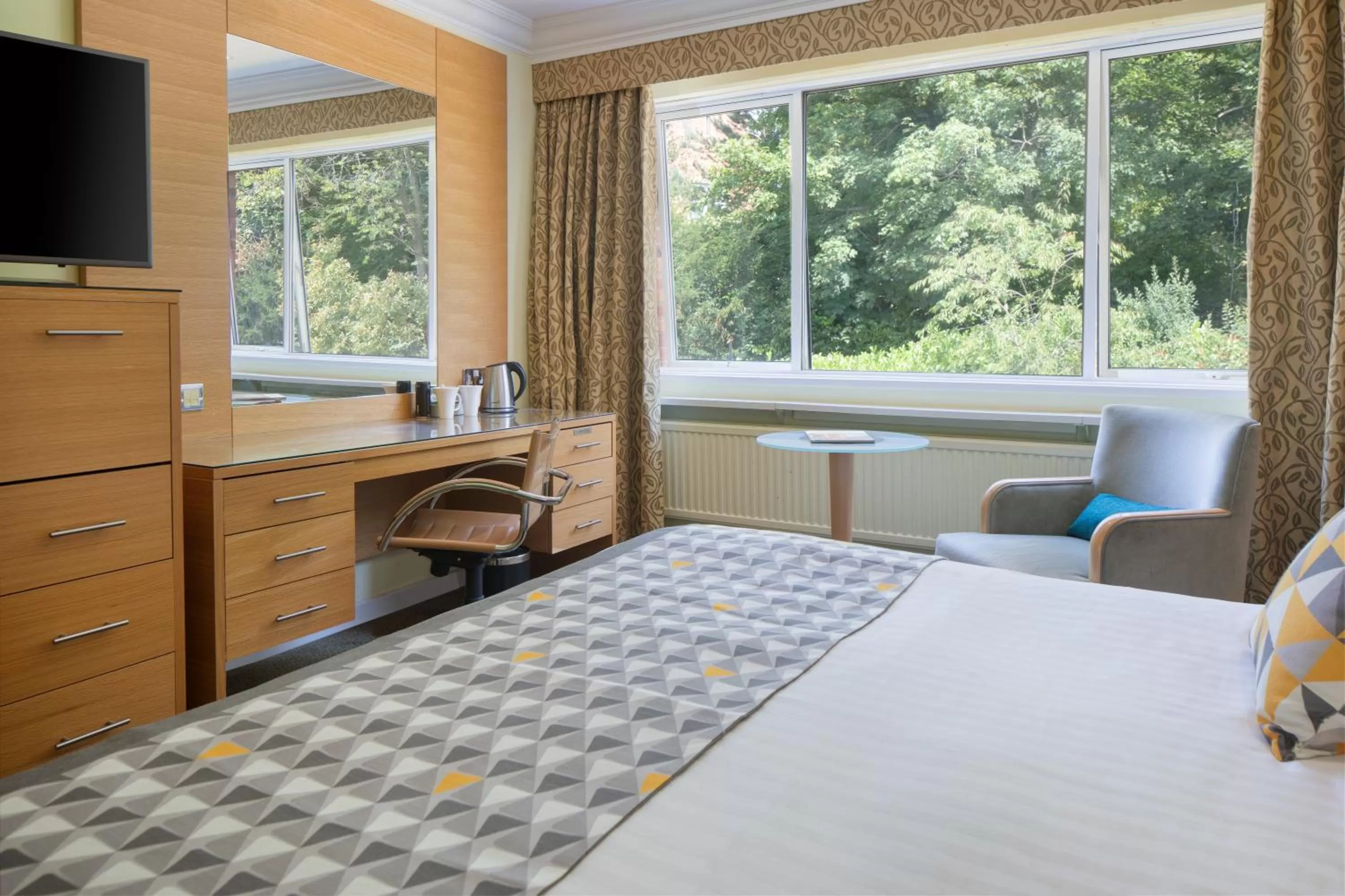 Bed in The Welcombe Golf & Spa Hotel