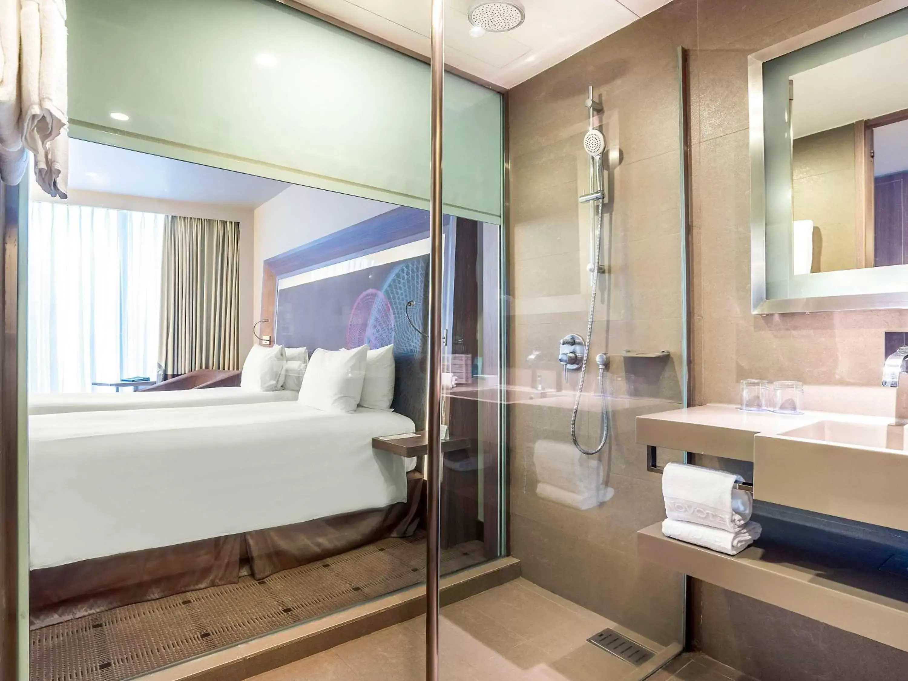 Bedroom, Bathroom in Novotel Bangkok Platinum Pratunam