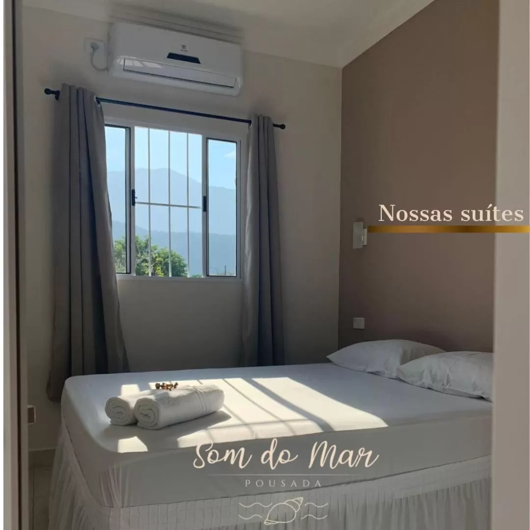 Bed in Pousada Recanto Som do Mar