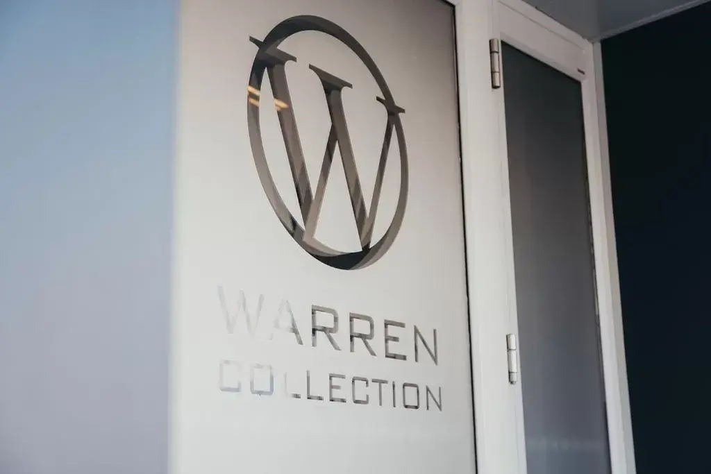 Property Logo/Sign in Quarter by the Warren Collection