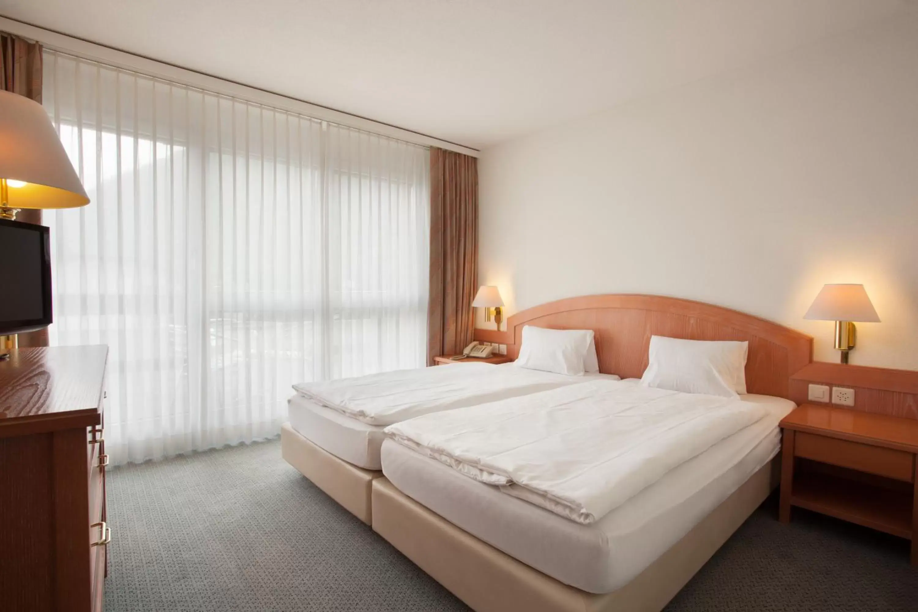 Two Bedroom Suite with balcony in Central Swiss Quality Sporthotel
