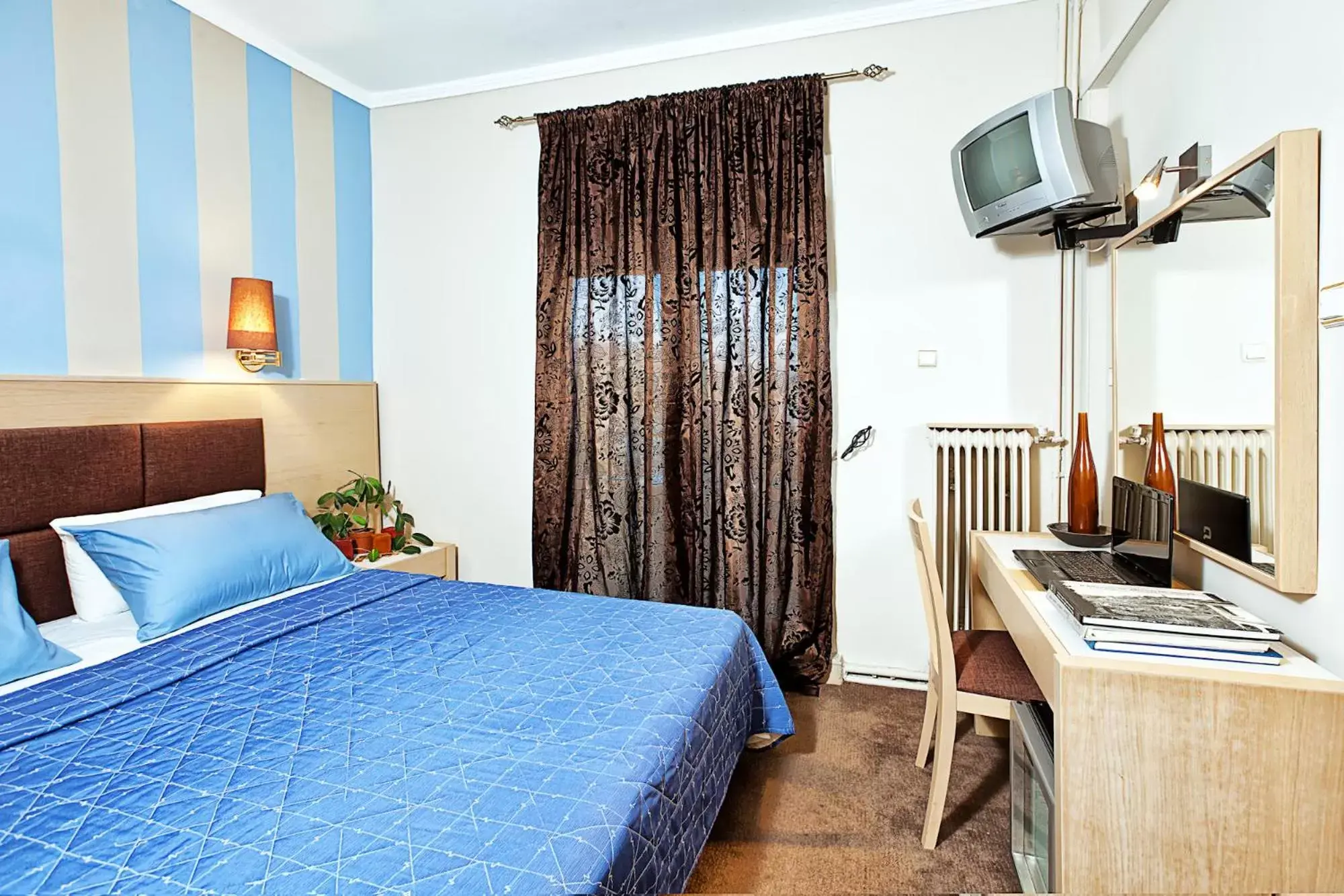 Property building, Bed in Anastassiou Hotel
