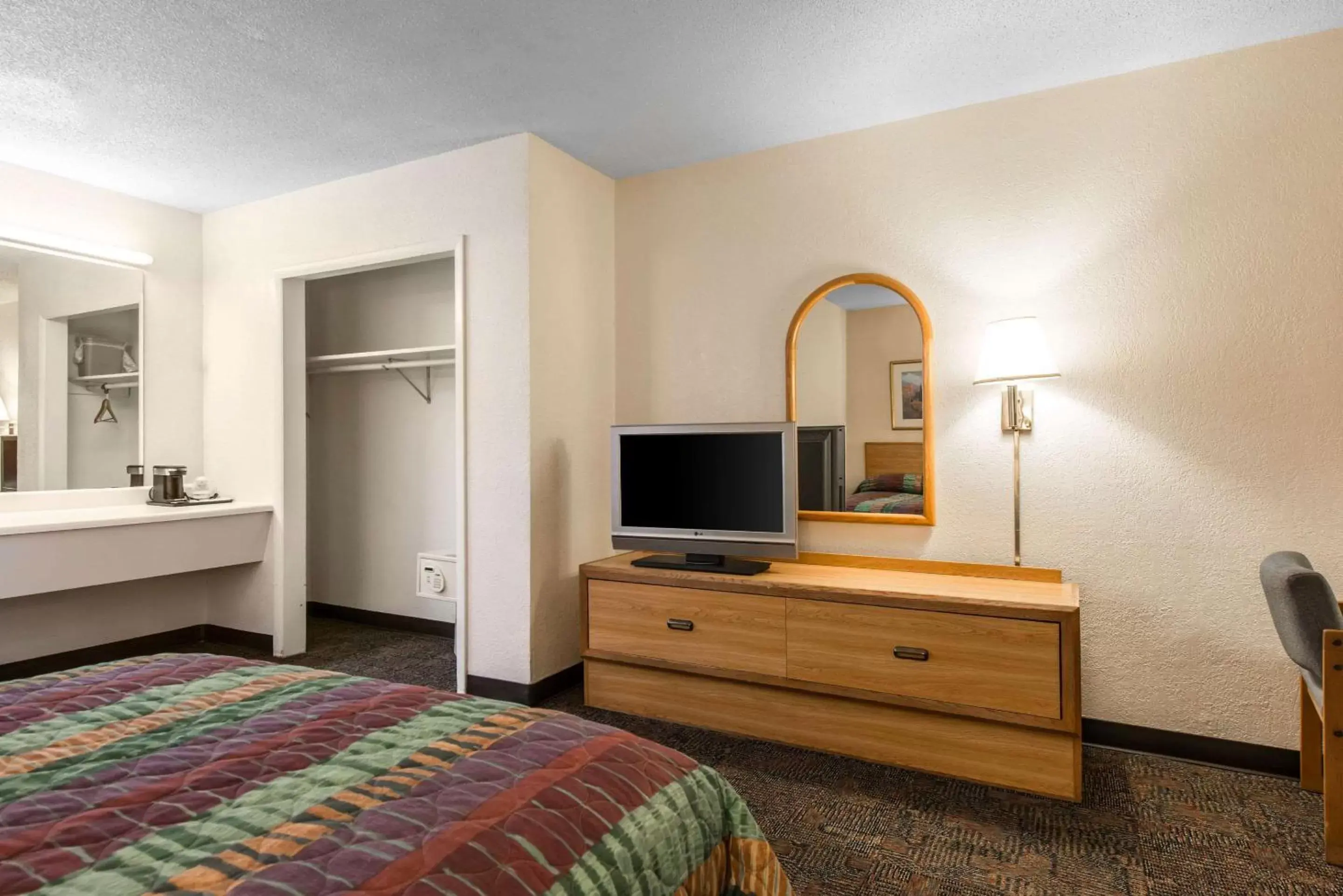 Photo of the whole room, TV/Entertainment Center in Rodeway Inn & Suites Colorado Springs