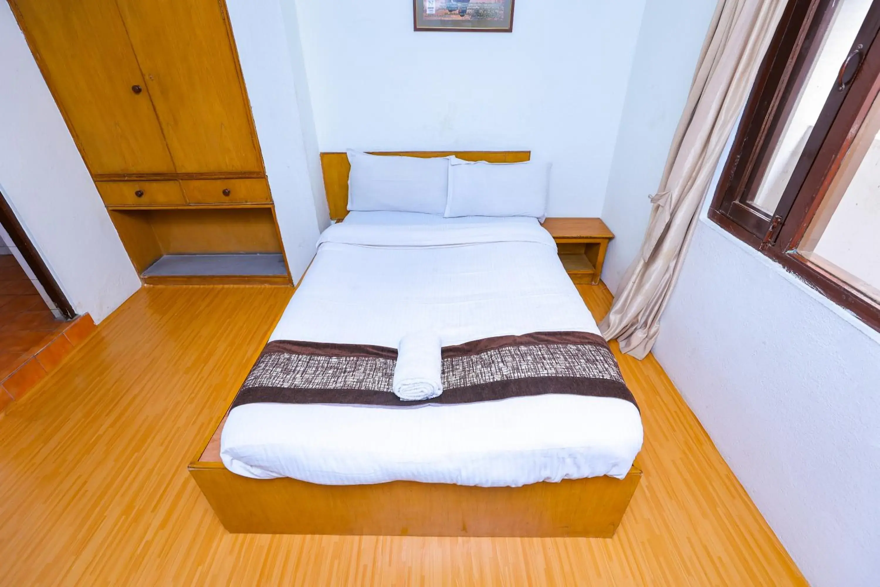 Bed in Hotel Nana