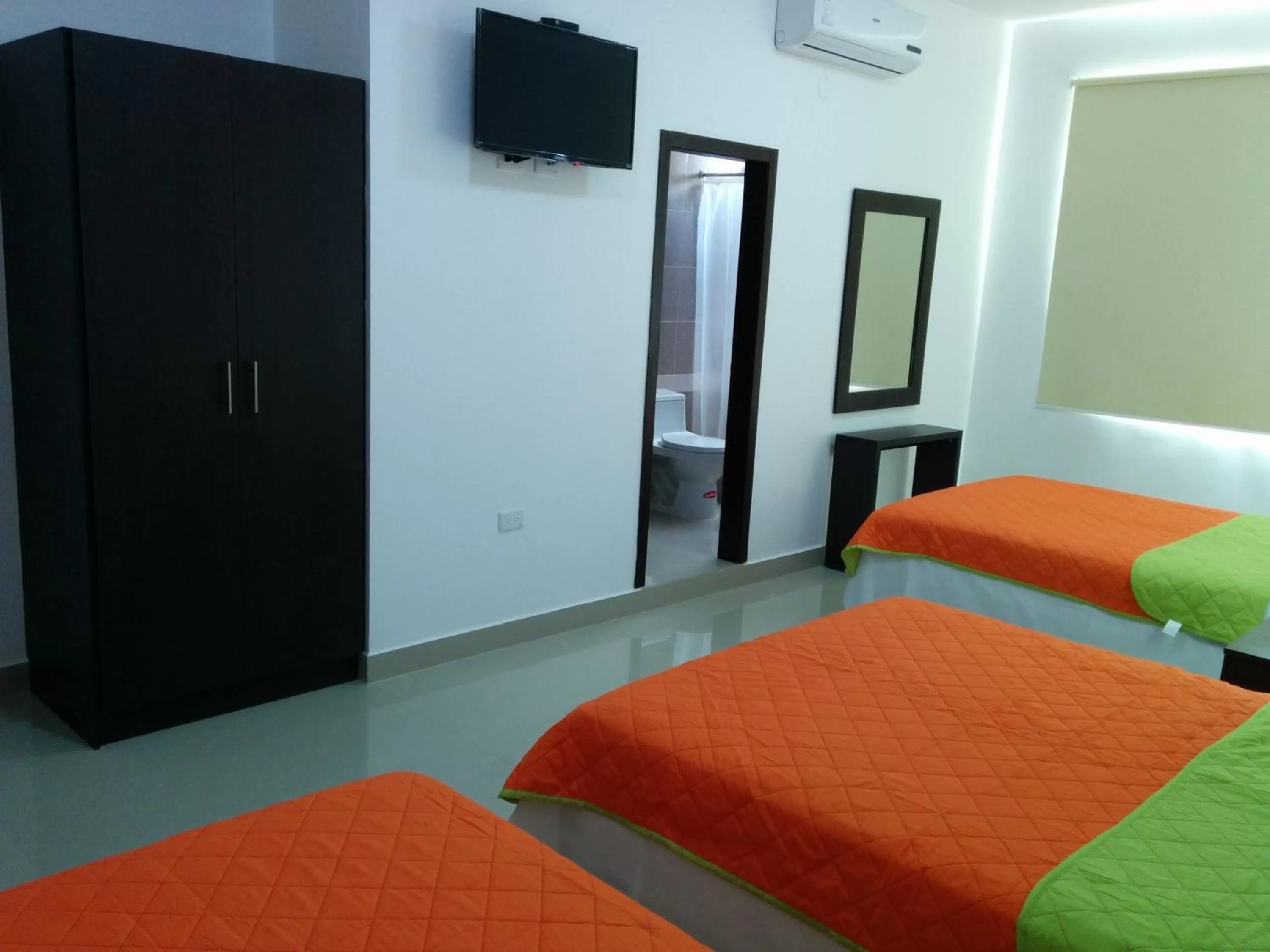 Bed in Manta Airport Hotel