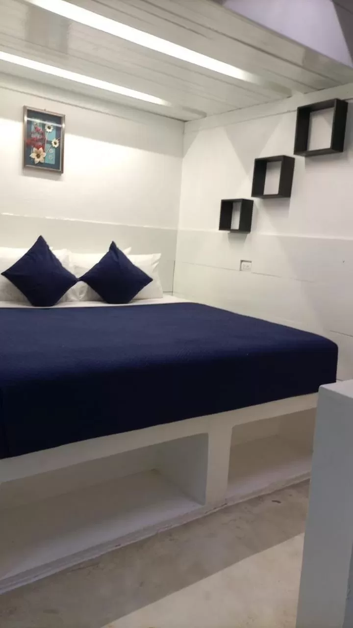 Bed in Beach Front TGR Hotels and Resorts