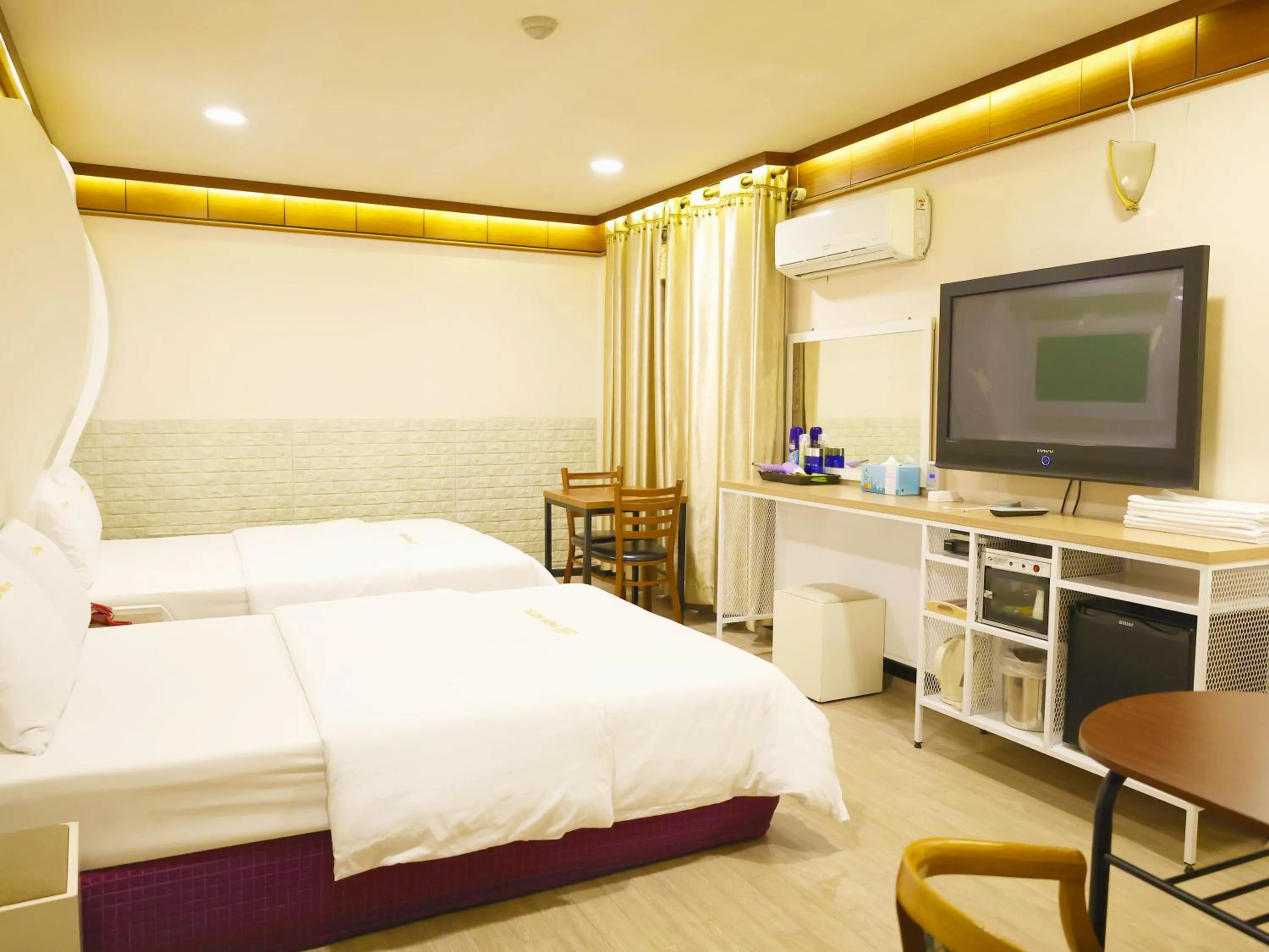Bed in Goodstay Andong Park Hotel