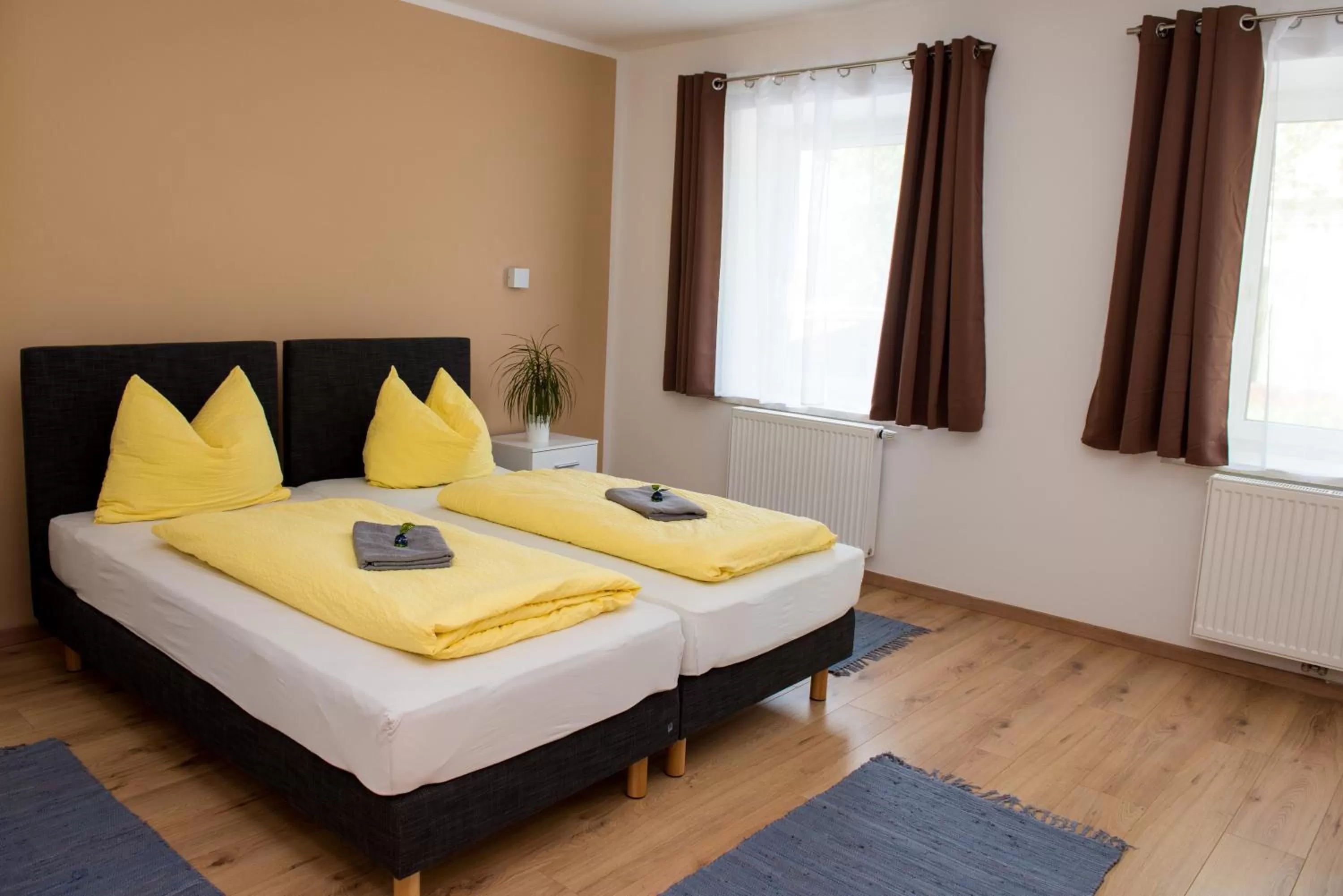 Bed in Ferienwohnungen und Zimmer Yassi