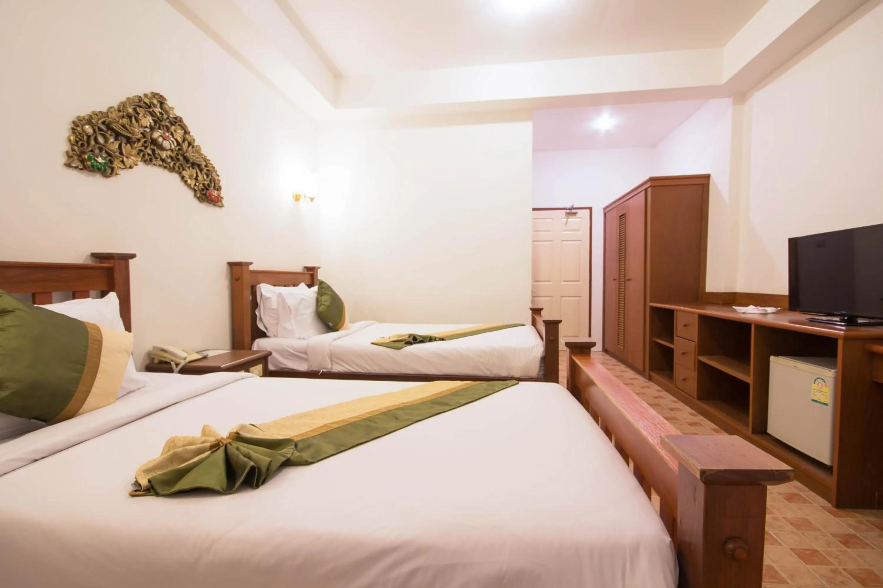 Photo of the whole room, Bed in Rajapruek Samui Resort - SHA Plus