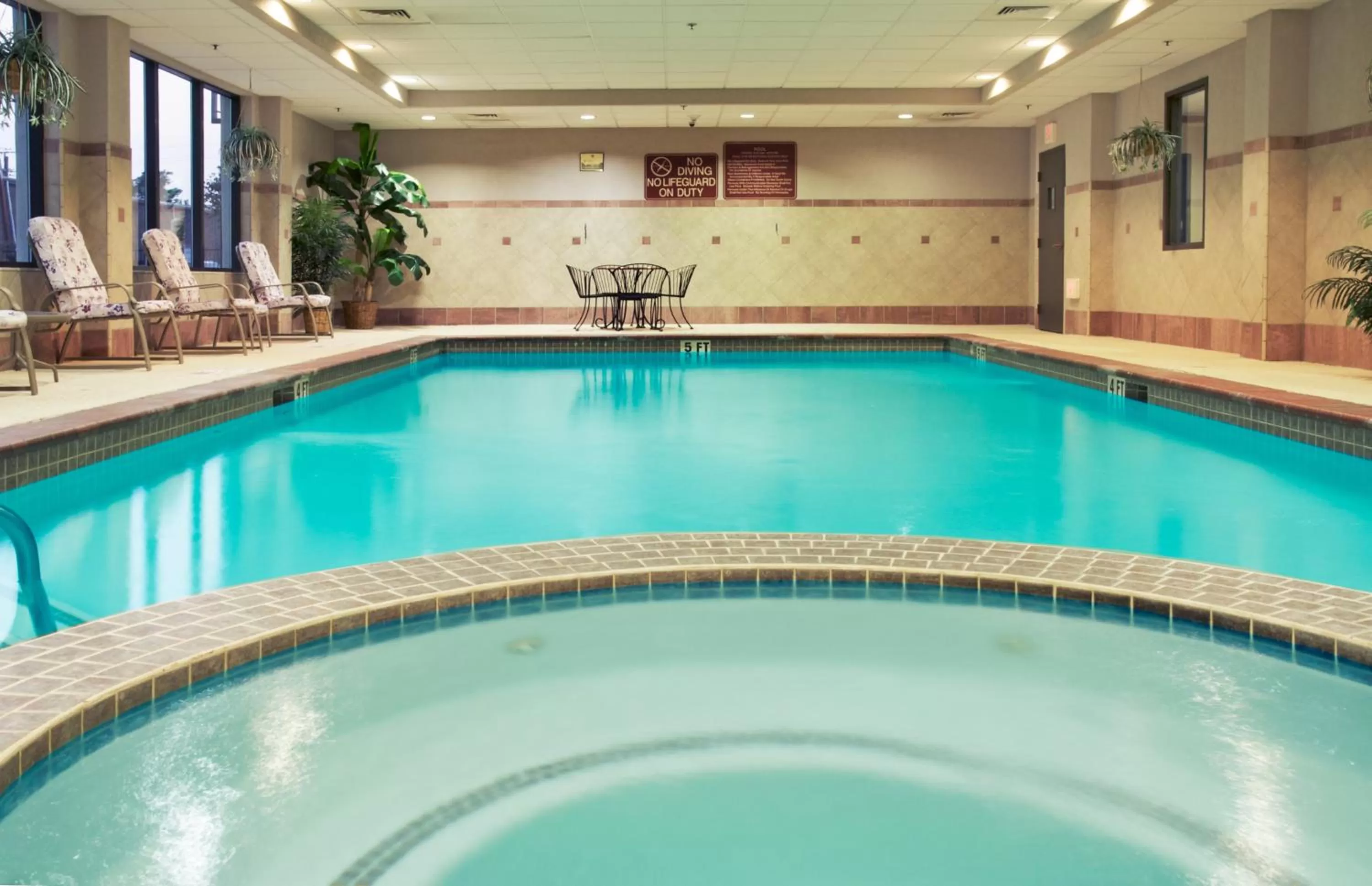 Swimming pool in Holiday Inn Express & Suites Houston - Memorial Park Area by IHG