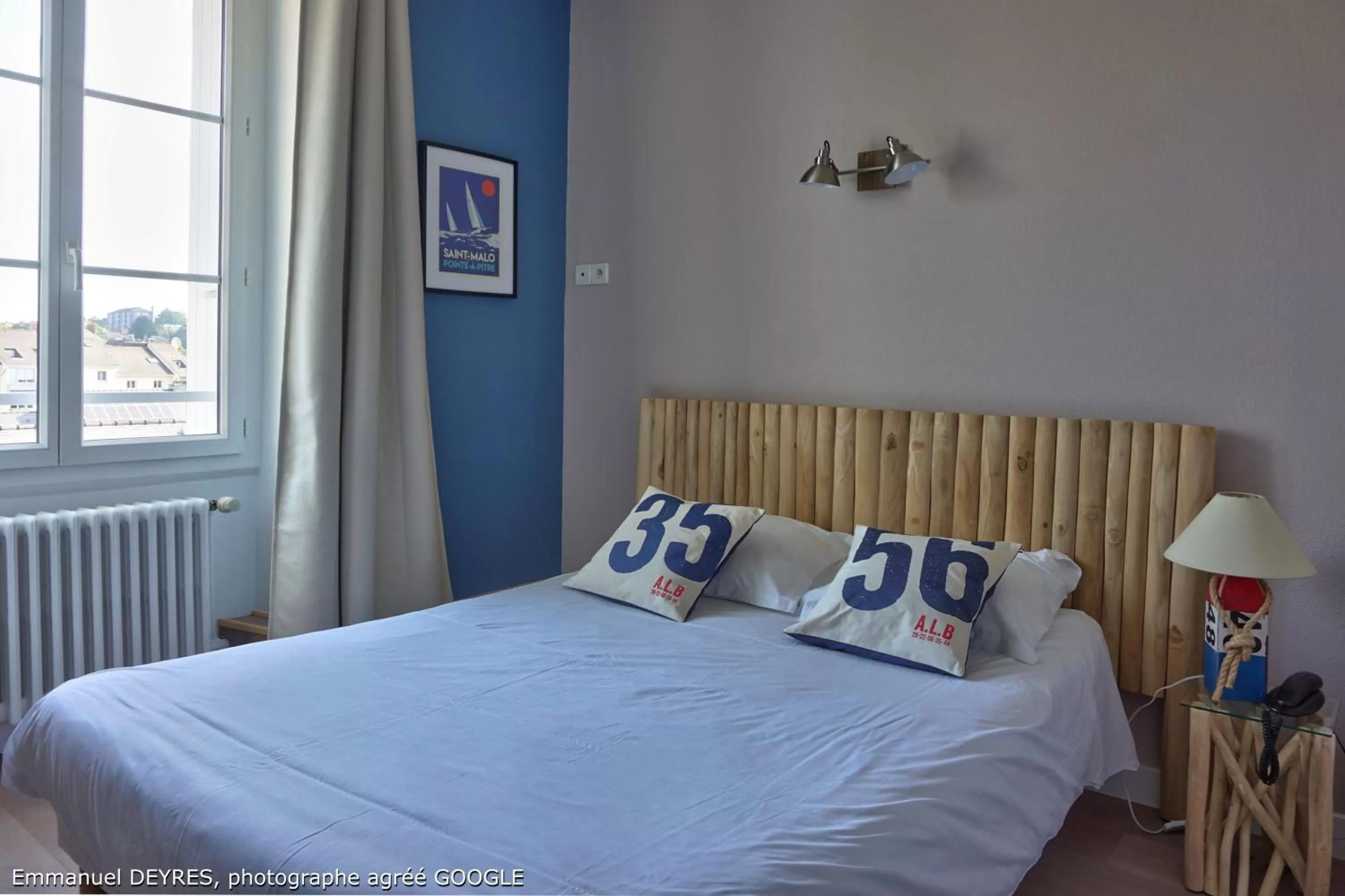 Bed in Hôtel de Bretagne - anciennement Queen Serenity Hotel