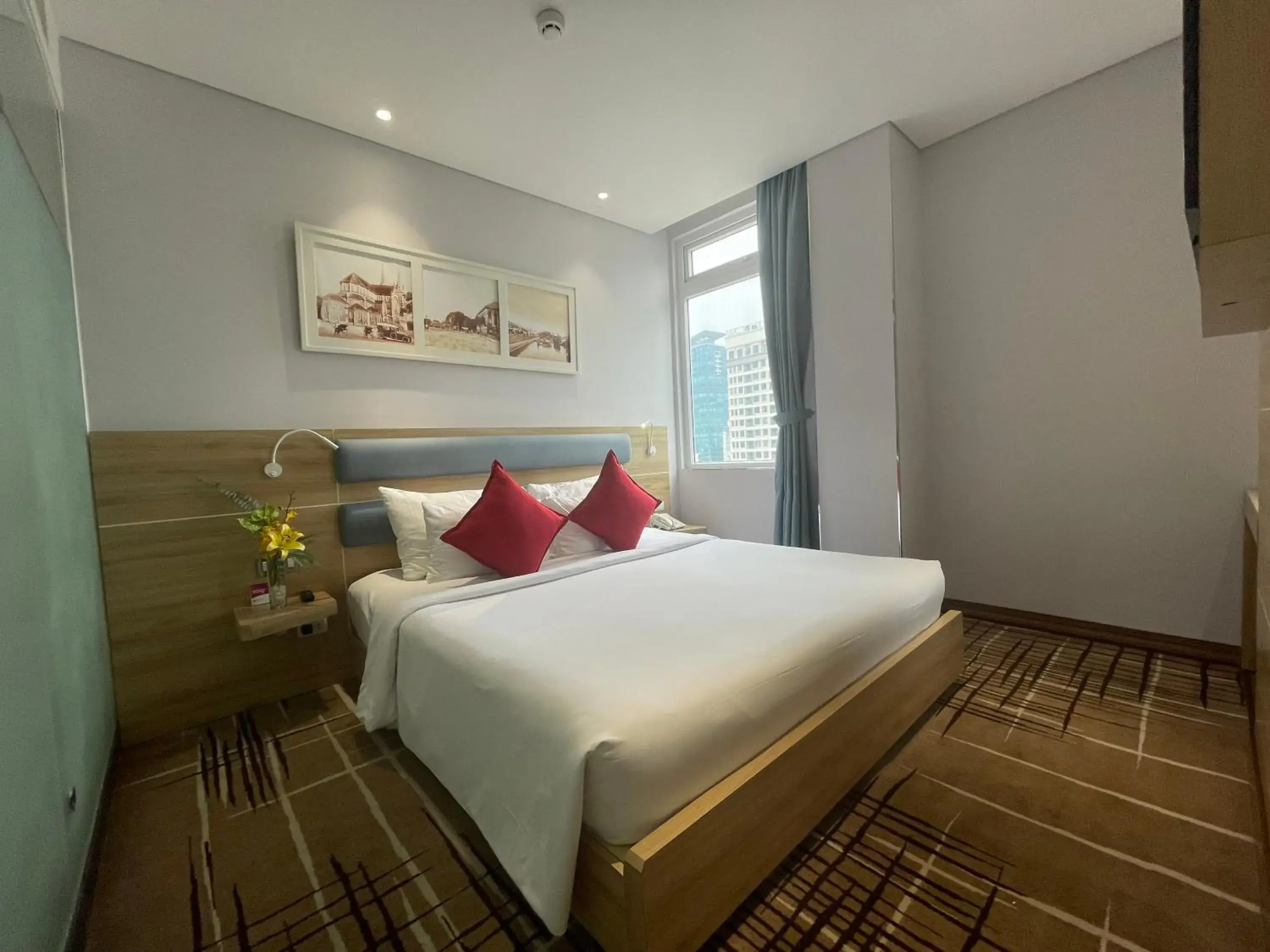 Bedroom, Bed in RAMADA ENCORE BY WYNDHAM SAIGON D1 - Formerly M Boutique Hotel Saigon